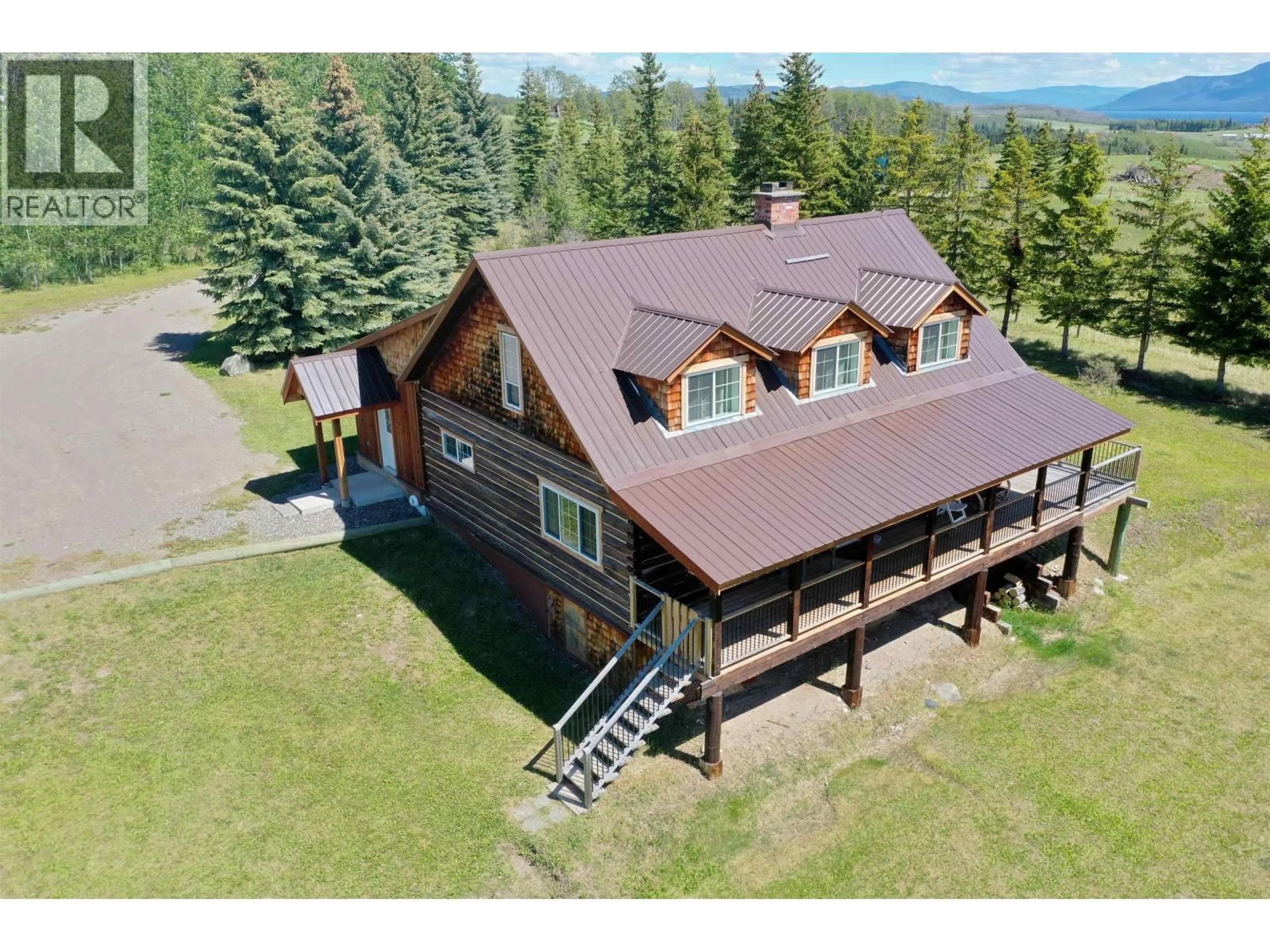 A pic from outside/outdoor area/front of a property/back of a property/a pic from drone, mountain view for 7227 BROWN ROAD, Burns Lake British Columbia V0J1E2