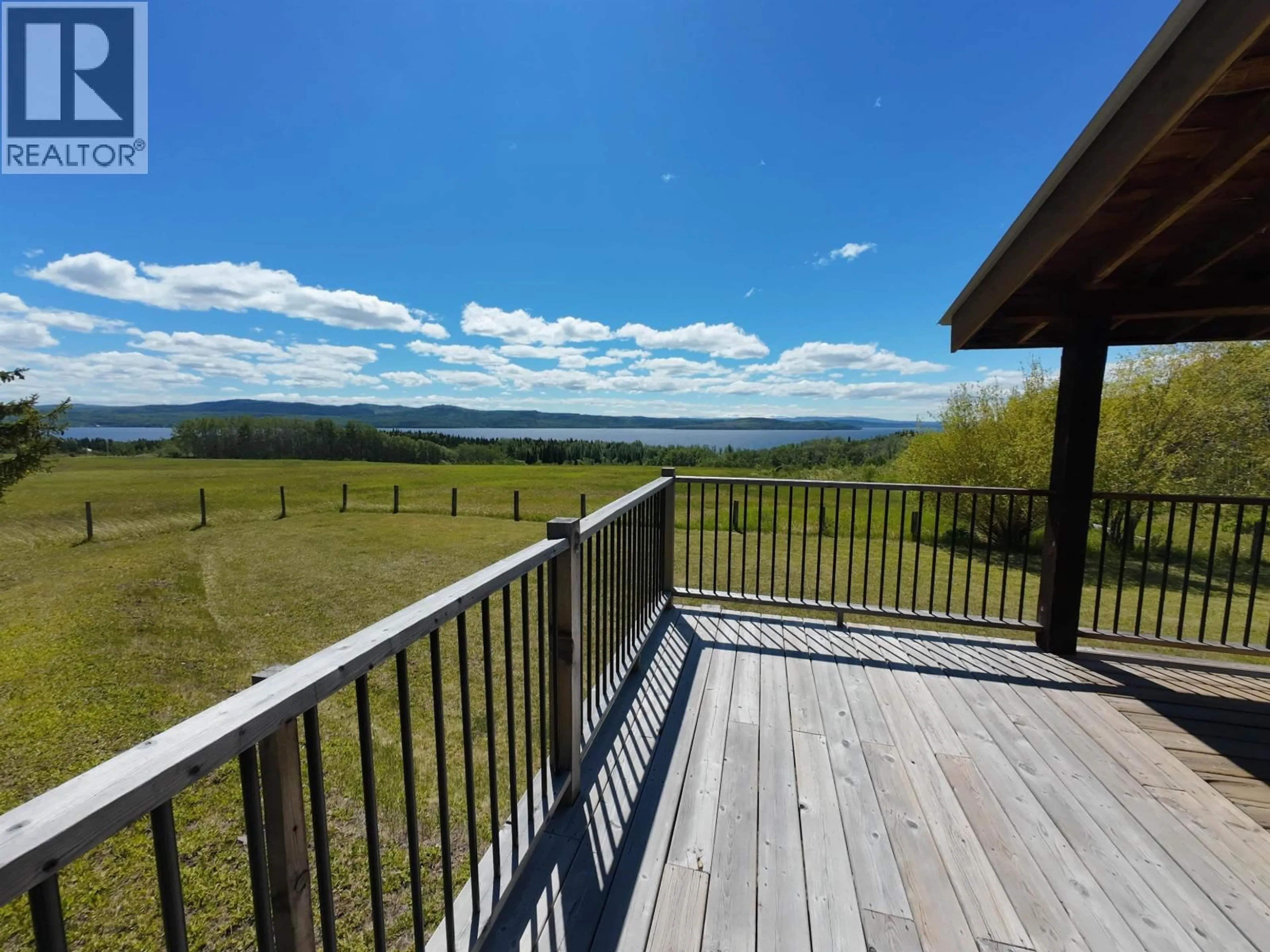 A pic from outside/outdoor area/front of a property/back of a property/a pic from drone, water/lake/river/ocean view for 7227 BROWN ROAD, Burns Lake British Columbia V0J1E2