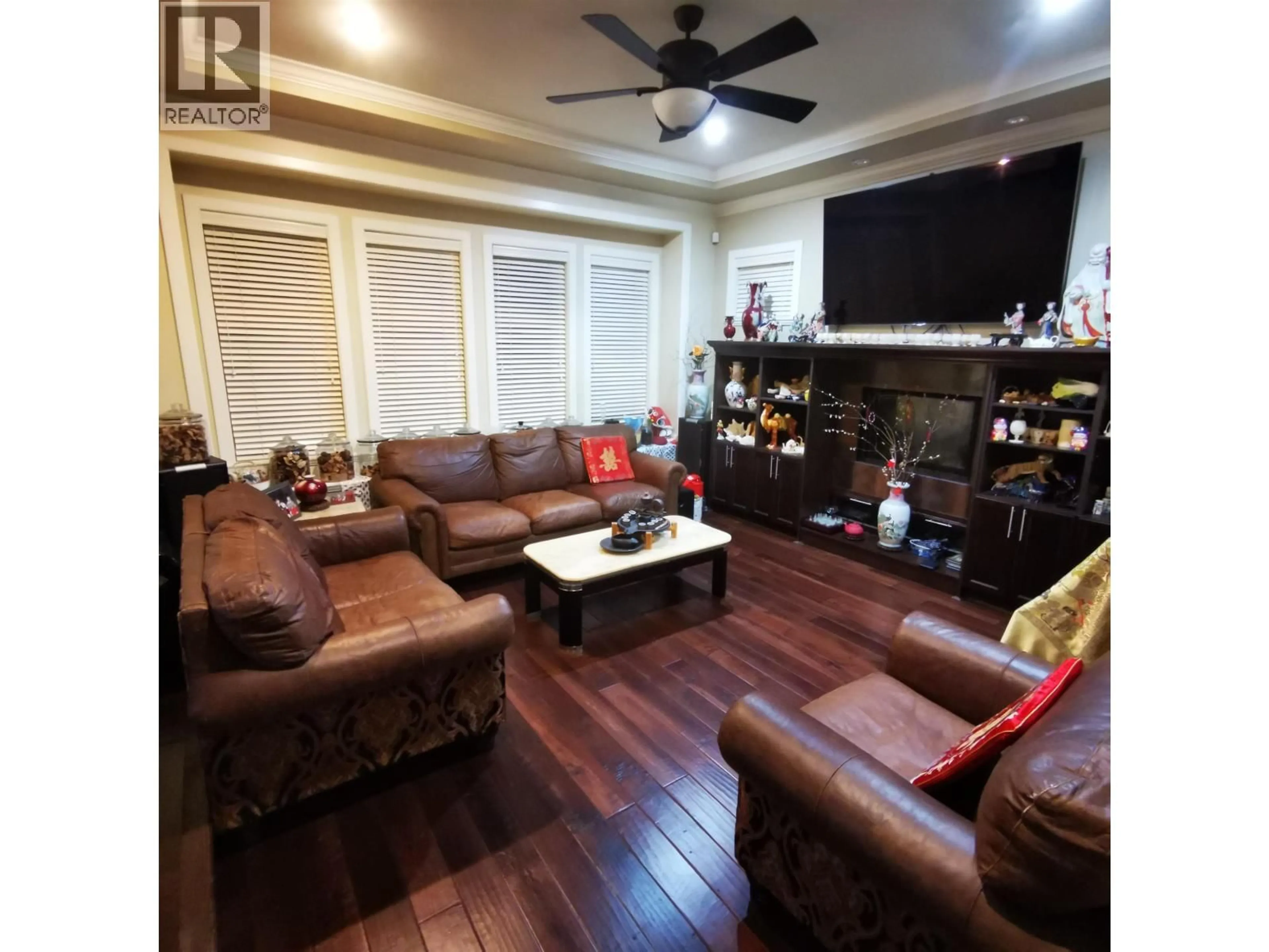 Living room with furniture, wood/laminate floor for 2406 NORCREST COURT, Burnaby British Columbia V3J1C6