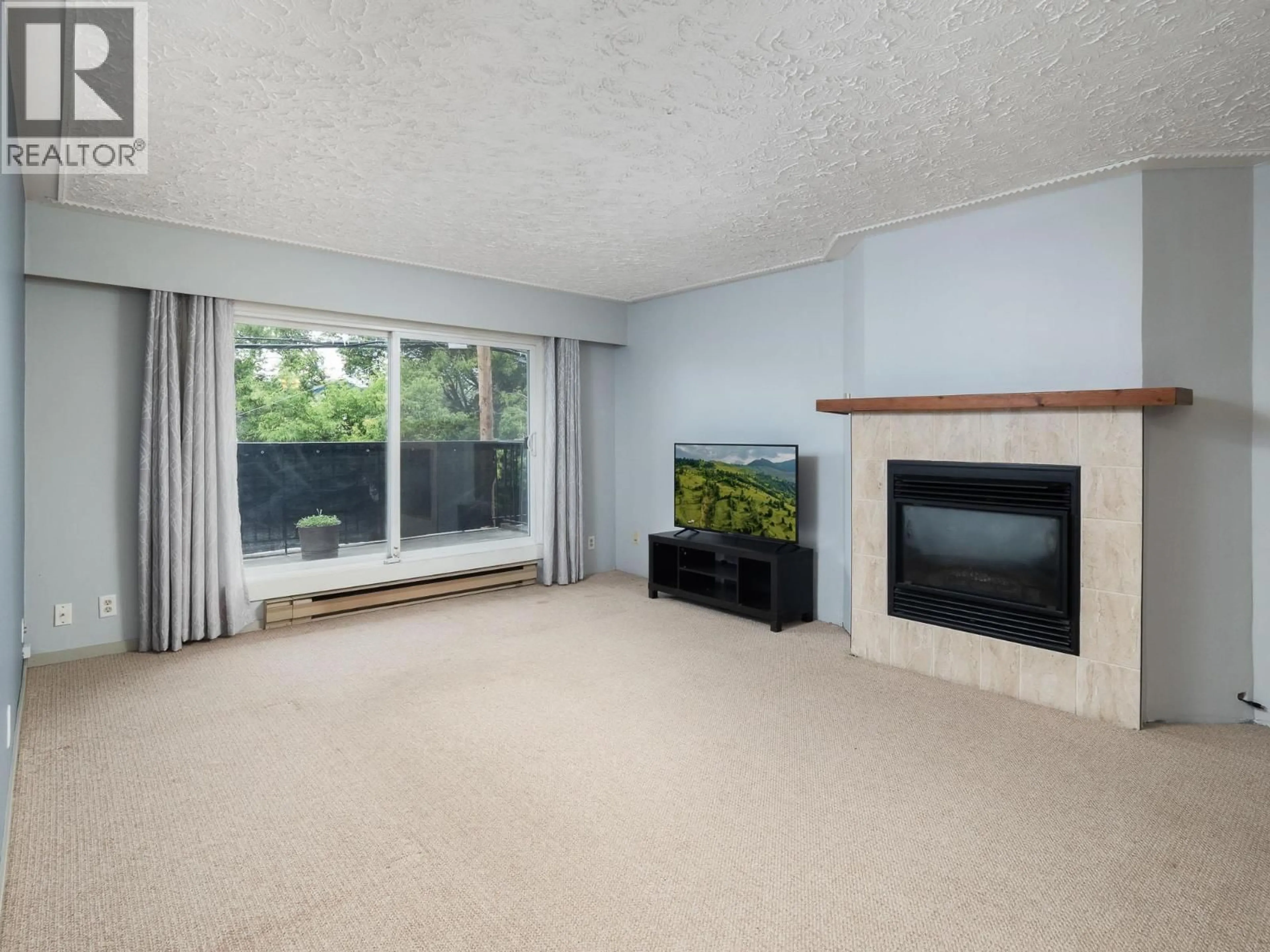 Living room with furniture, unknown for 107 - 1654 10TH AVENUE, Prince George British Columbia V2L3S4