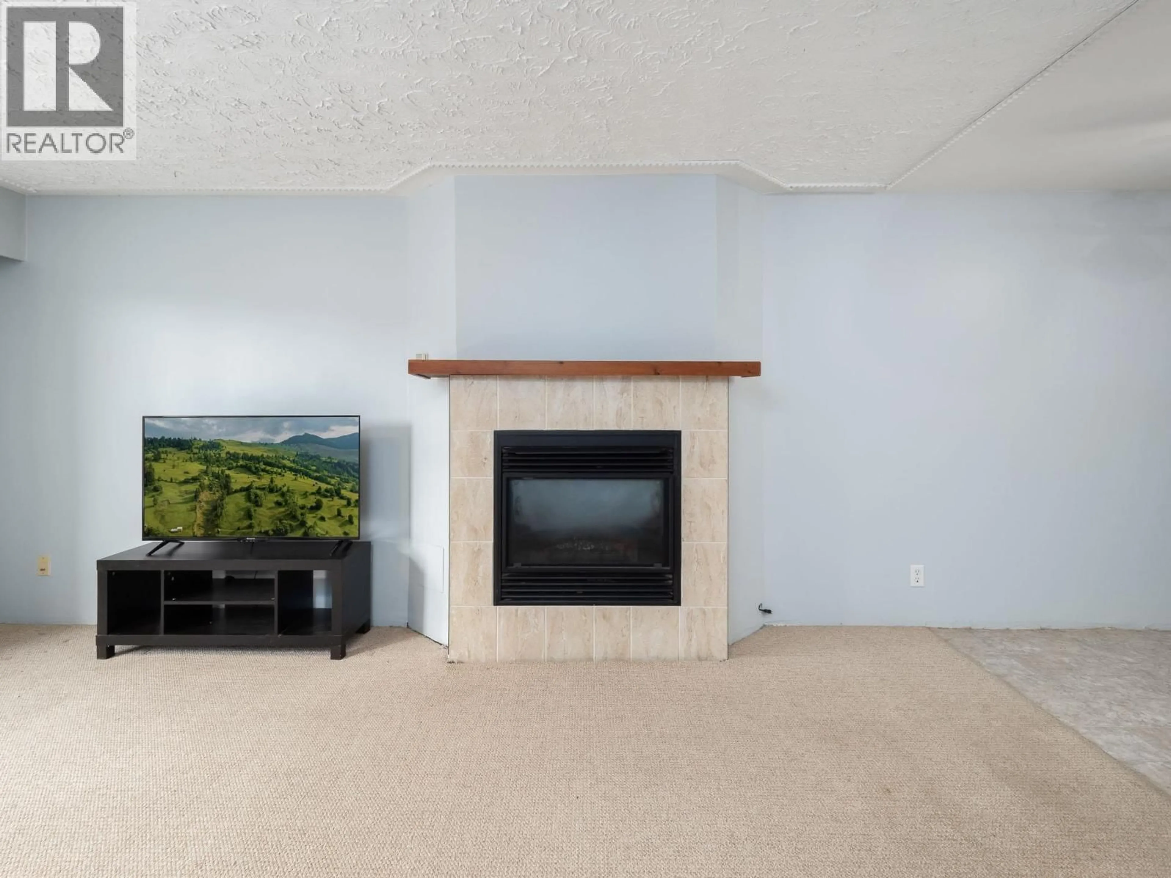 Living room with furniture, unknown for 107 - 1654 10TH AVENUE, Prince George British Columbia V2L3S4