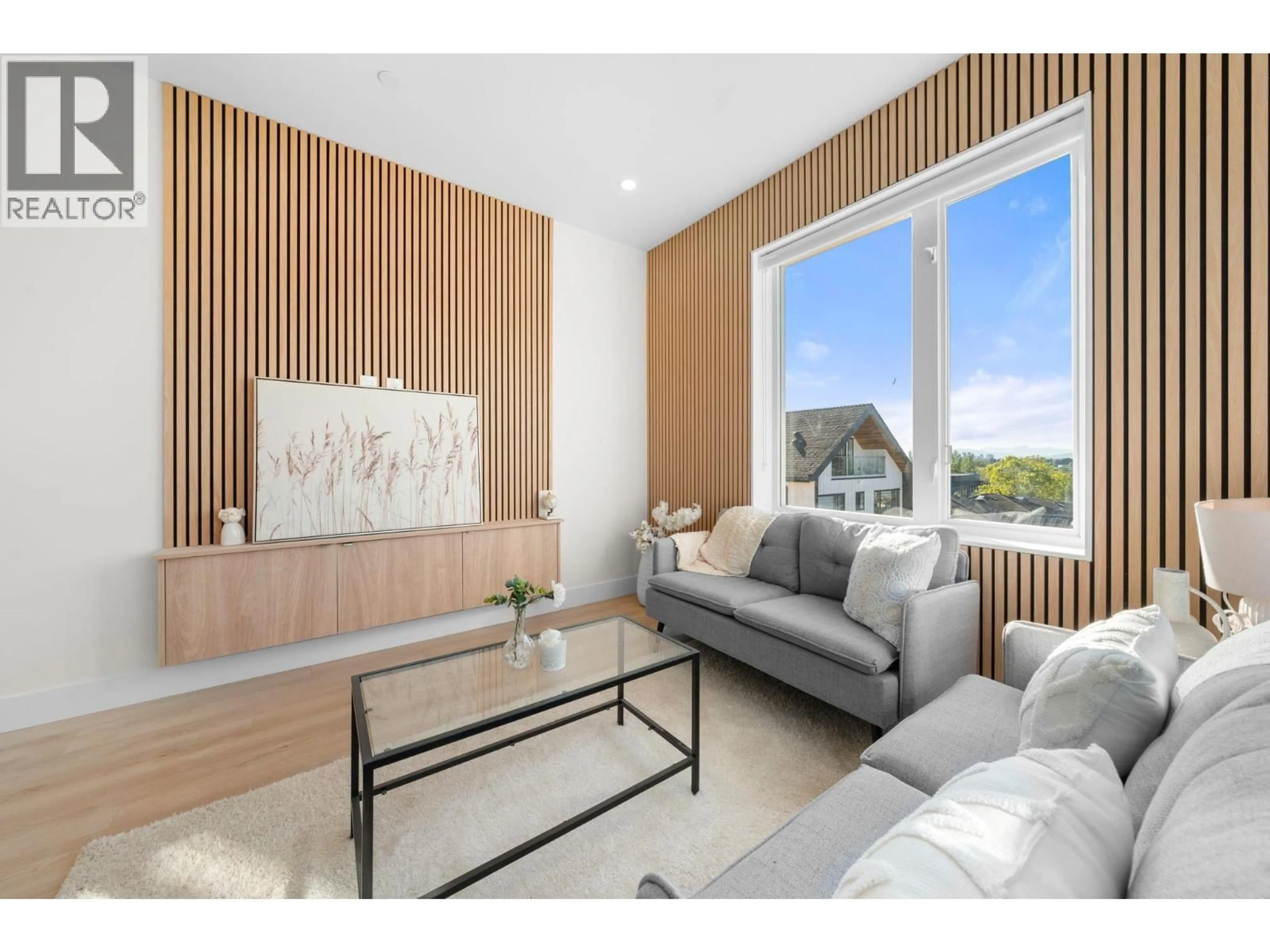 Living room with furniture, wood/laminate floor for 2 - 3583 HAIDA DRIVE, Vancouver British Columbia V5M3Y9