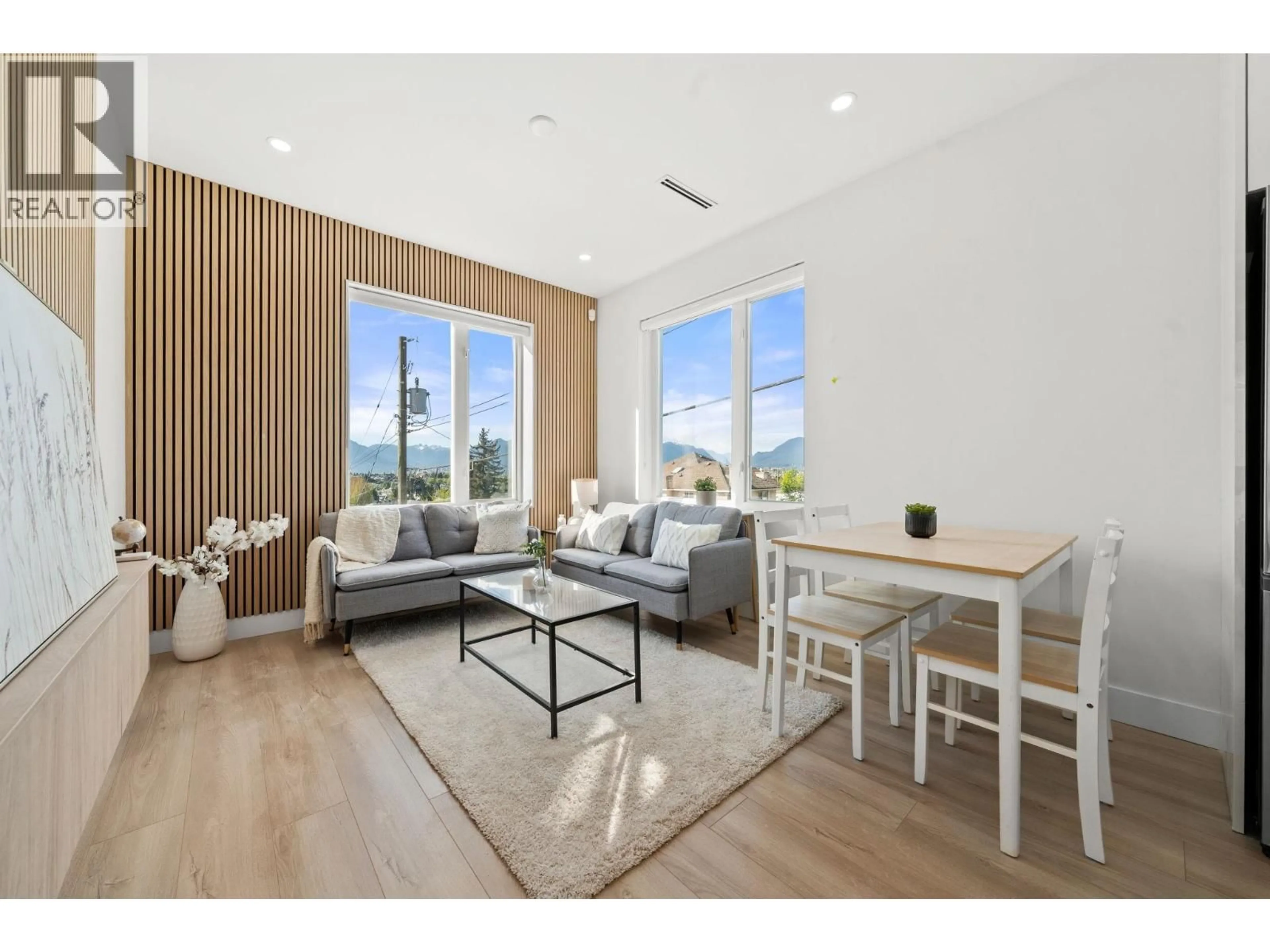 Living room with furniture, wood/laminate floor for 2 - 3583 HAIDA DRIVE, Vancouver British Columbia V5M3Y9