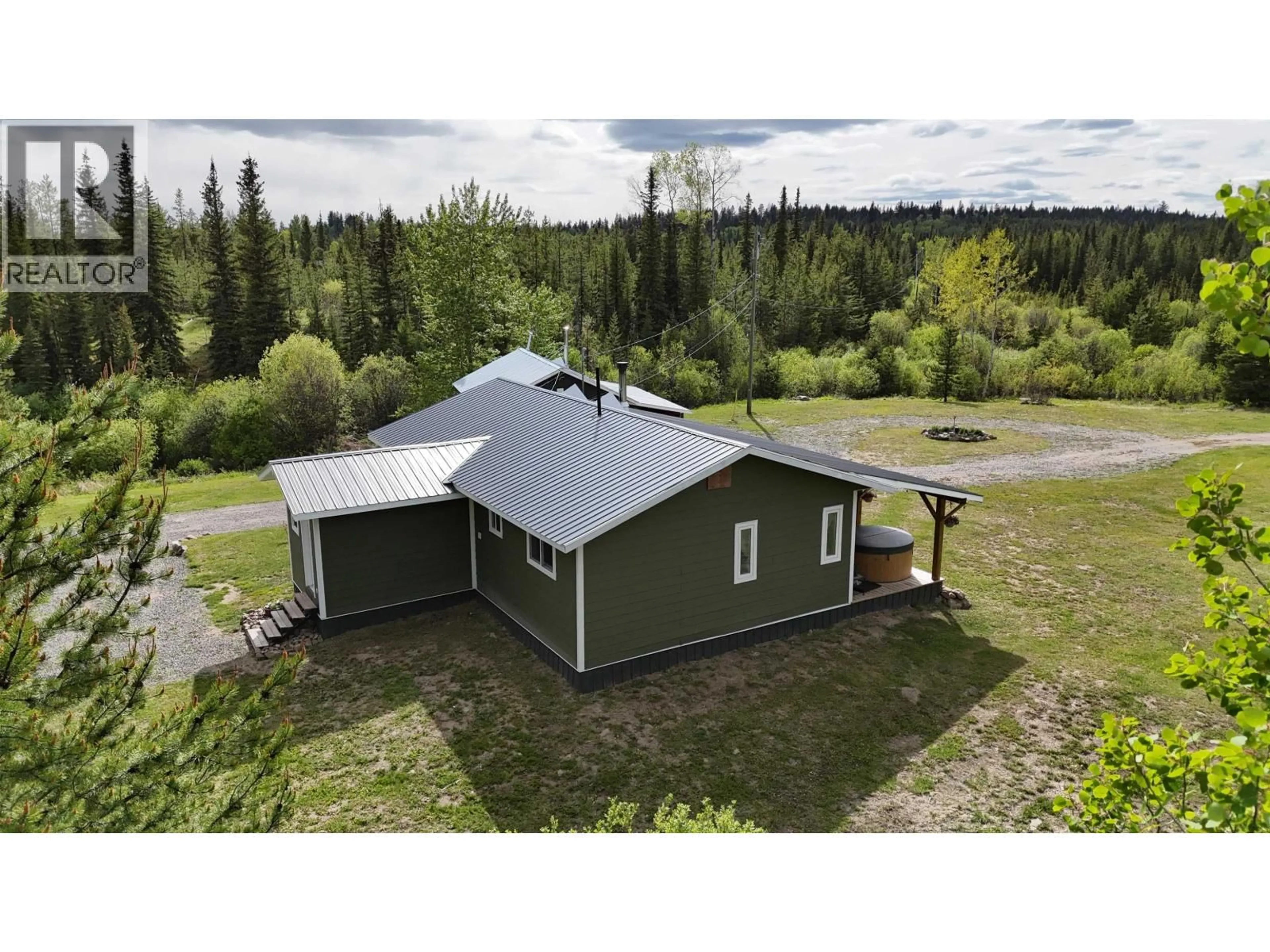 A pic from outside/outdoor area/front of a property/back of a property/a pic from drone, building for 7577 HIGH COUNTRY ROAD, Bridge Lake British Columbia V0K1X3