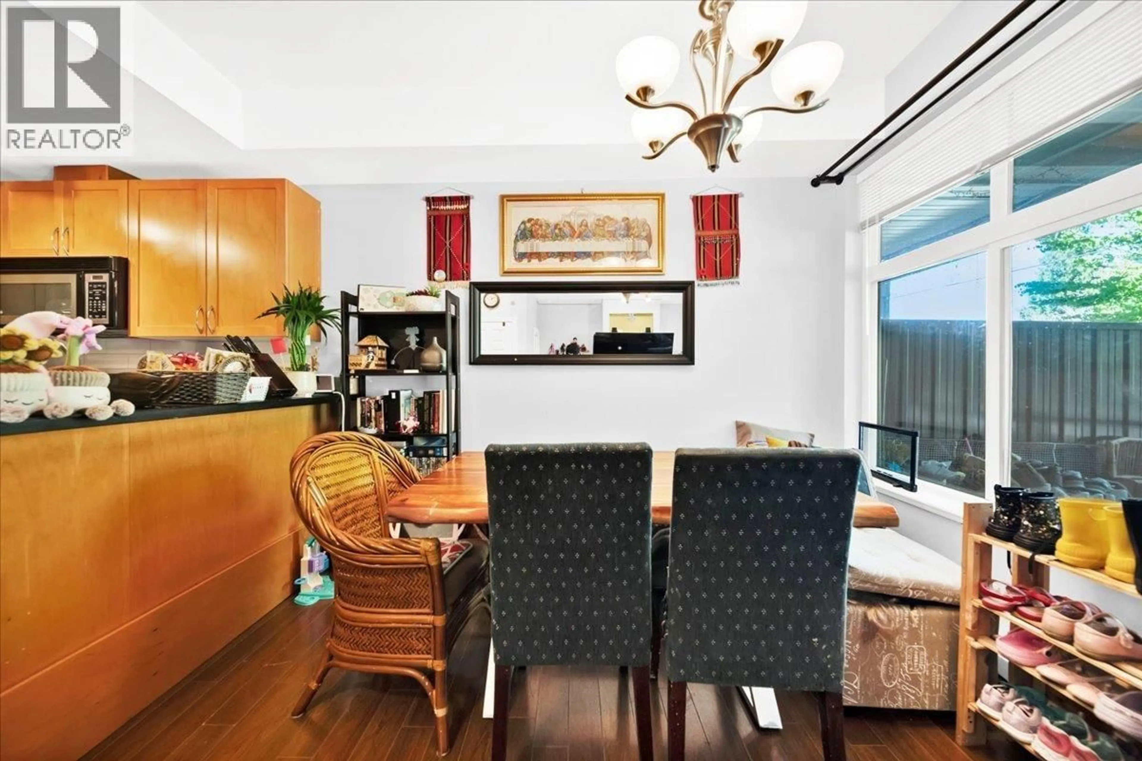 Dining room, wood/laminate floor for 207 - 7333 16TH AVENUE, Burnaby British Columbia V3N0A8