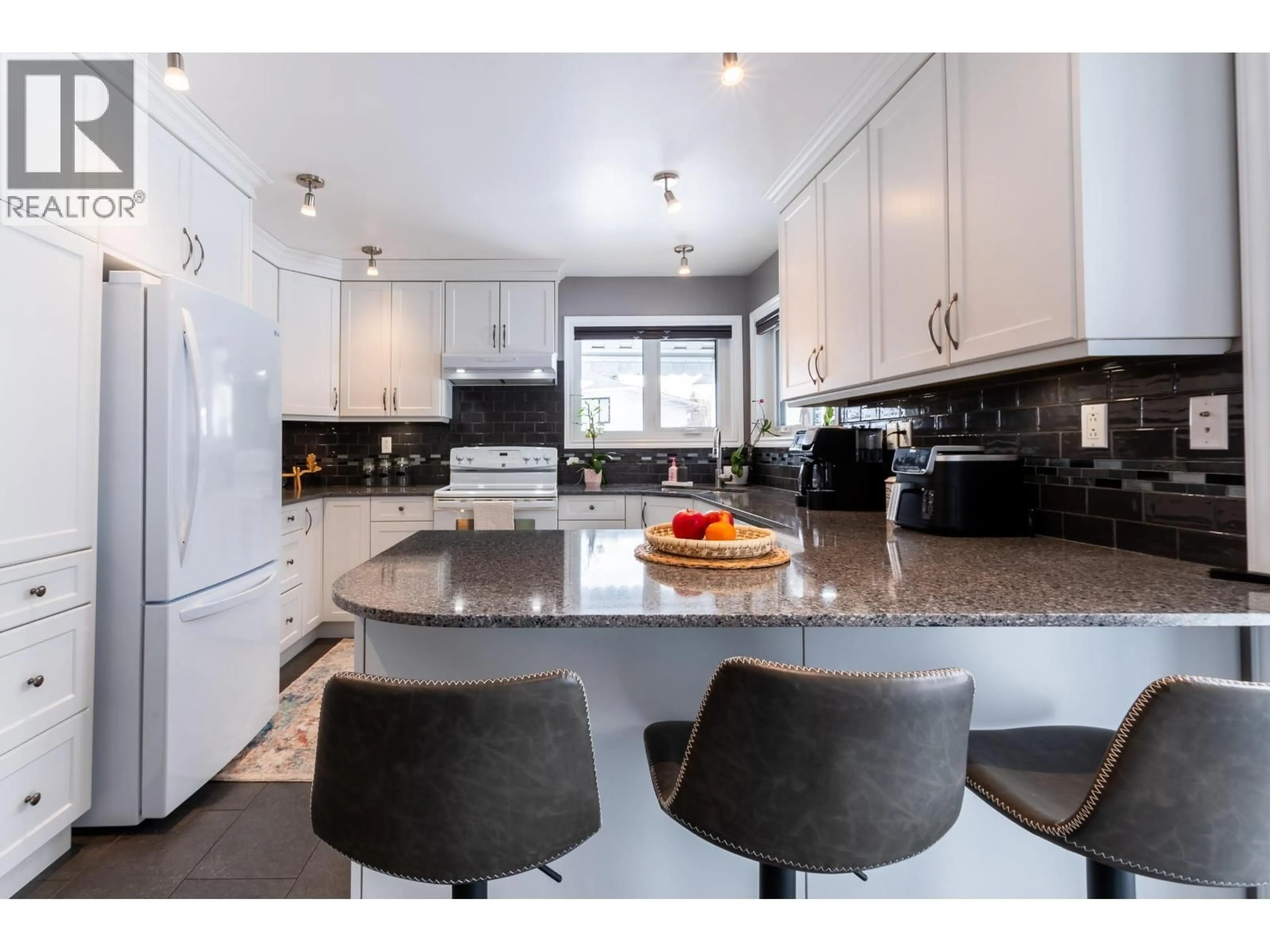 Open concept kitchen, ceramic/tile floor for 4549 DELTA PLACE, Prince George British Columbia V2M6J6
