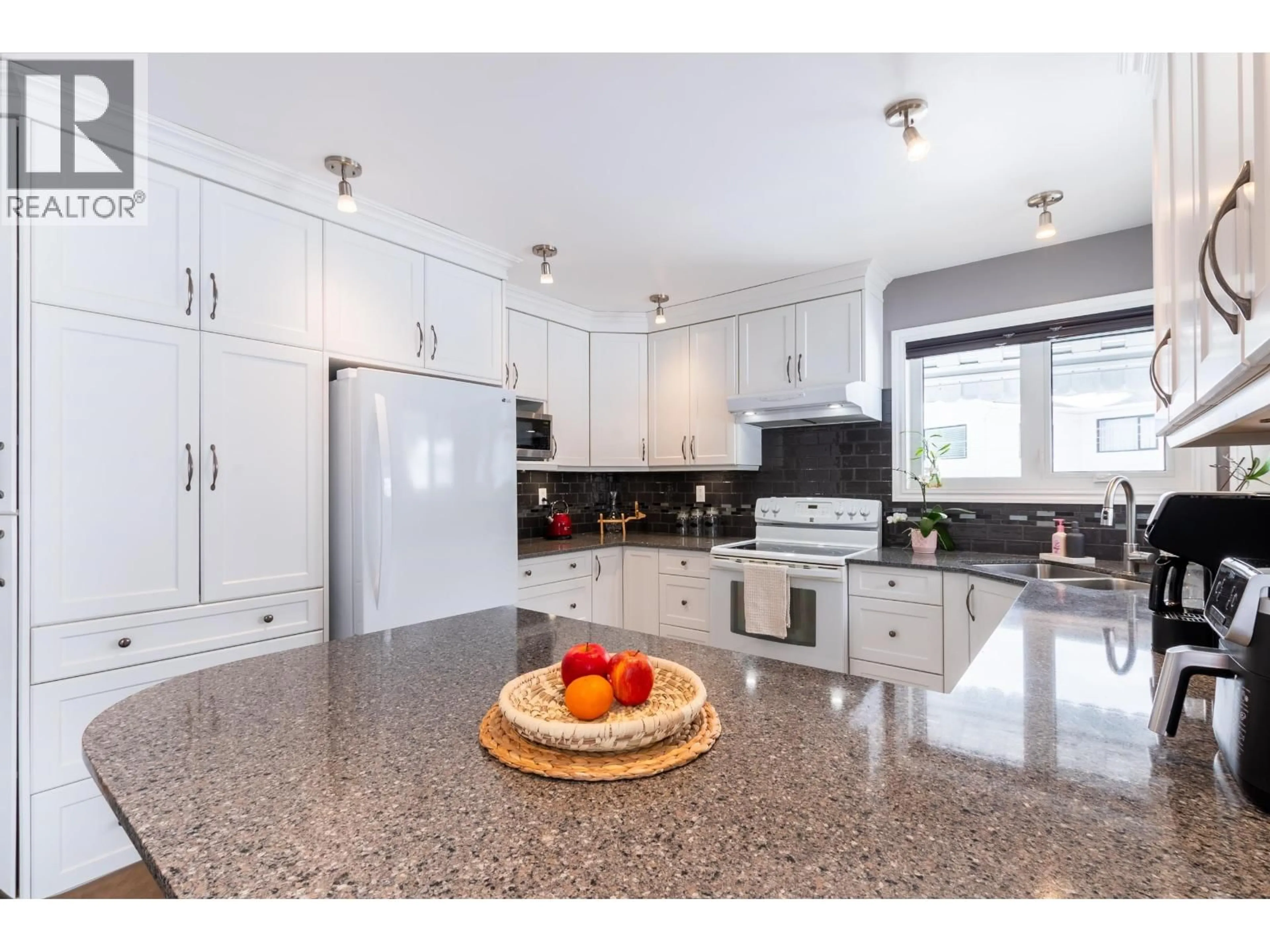 Open concept kitchen, ceramic/tile floor for 4549 DELTA PLACE, Prince George British Columbia V2M6J6