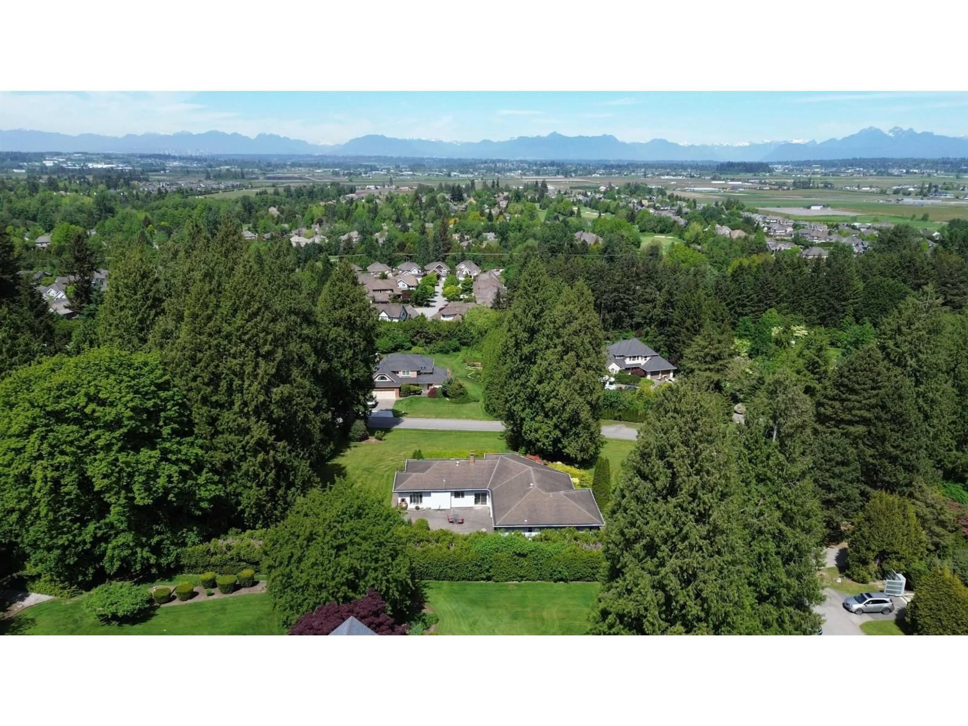 A pic from outside/outdoor area/front of a property/back of a property/a pic from drone, mountain view for 3039 163 STREET, Surrey British Columbia V3Z0E3