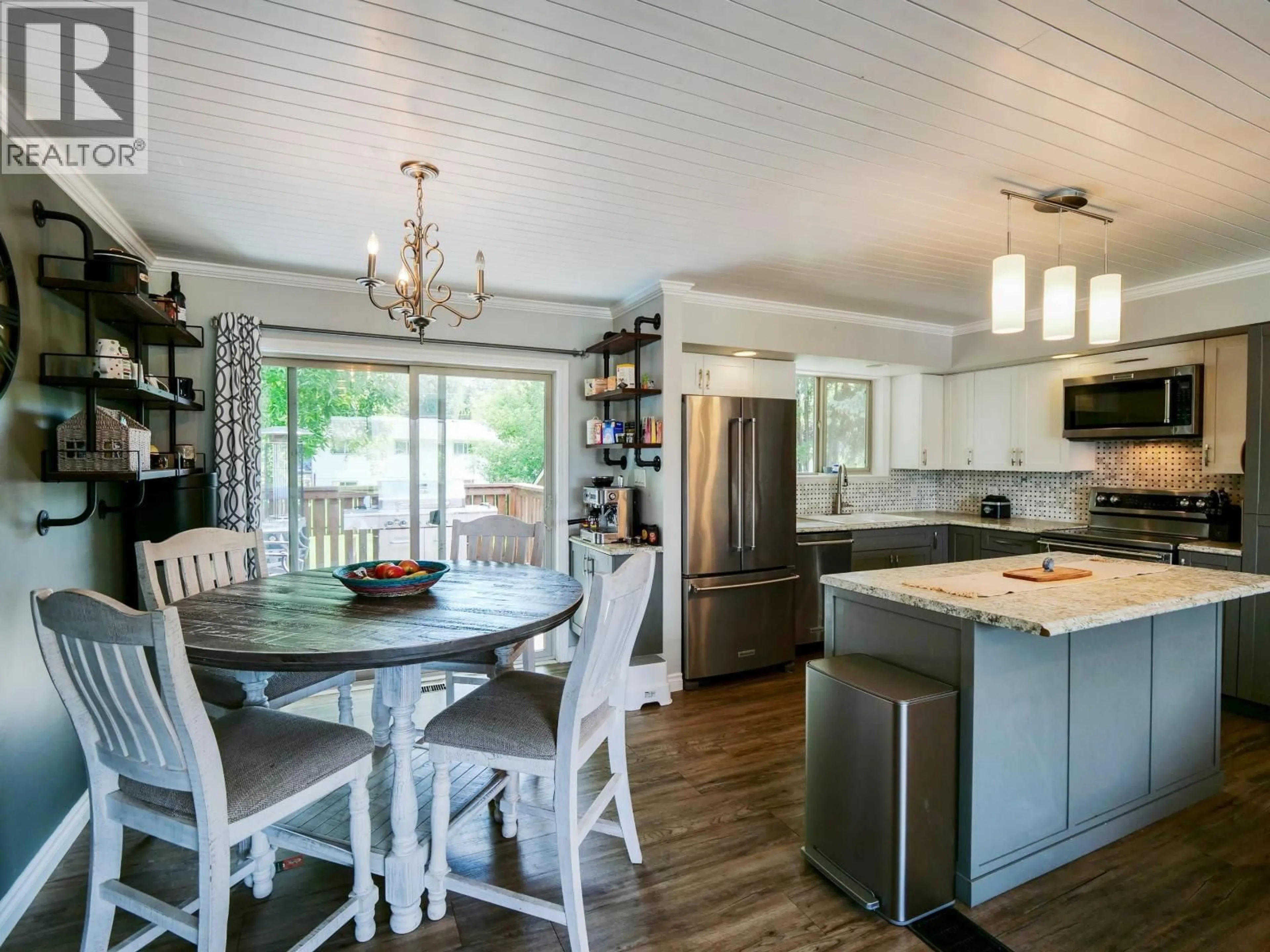 Open concept kitchen, wood/laminate floor for 530 NADEAU STREET, Quesnel British Columbia V2J2Z9