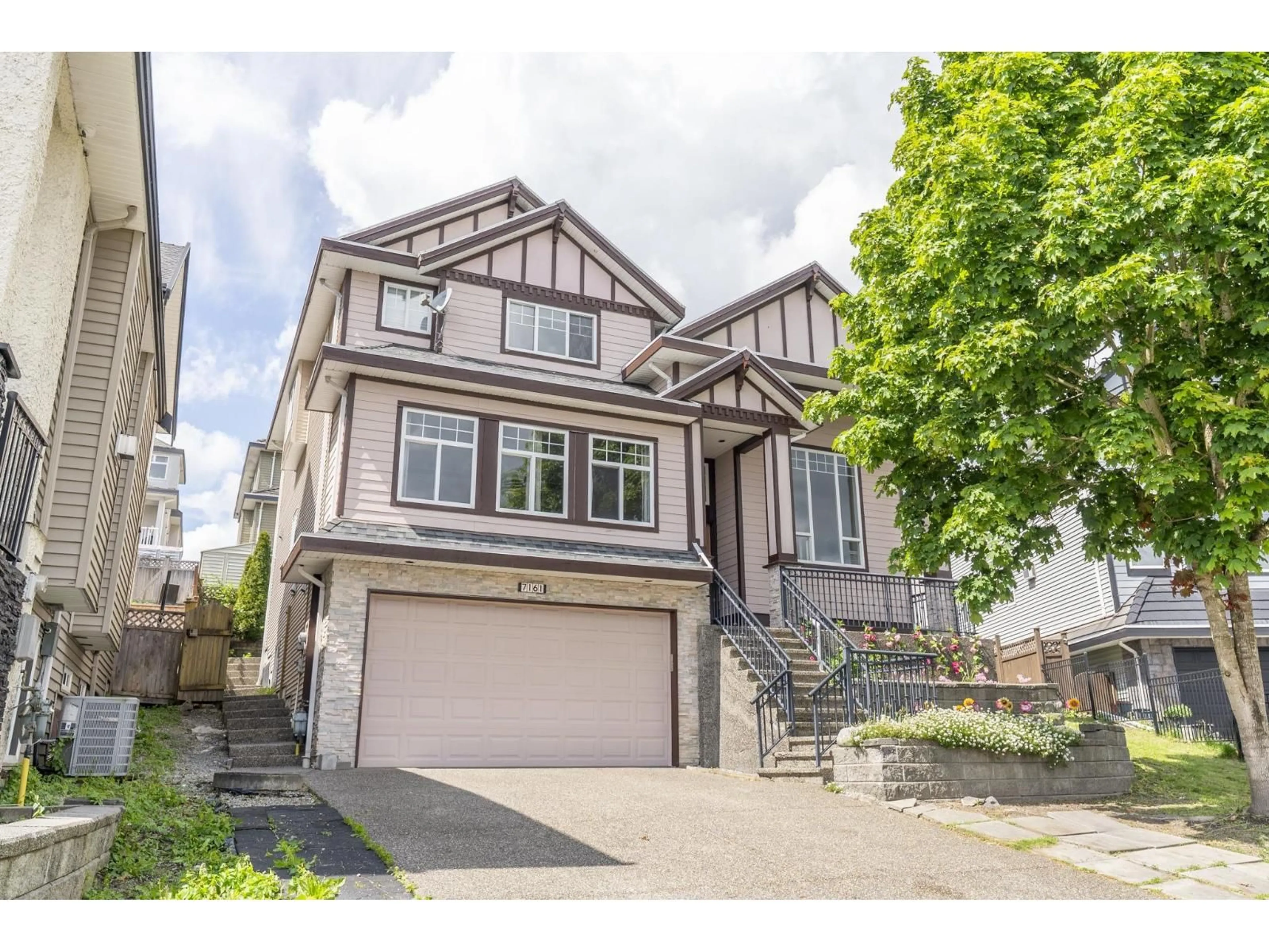 Home with vinyl exterior material, street for 7161 151 STREET, Surrey British Columbia V3S7Y8