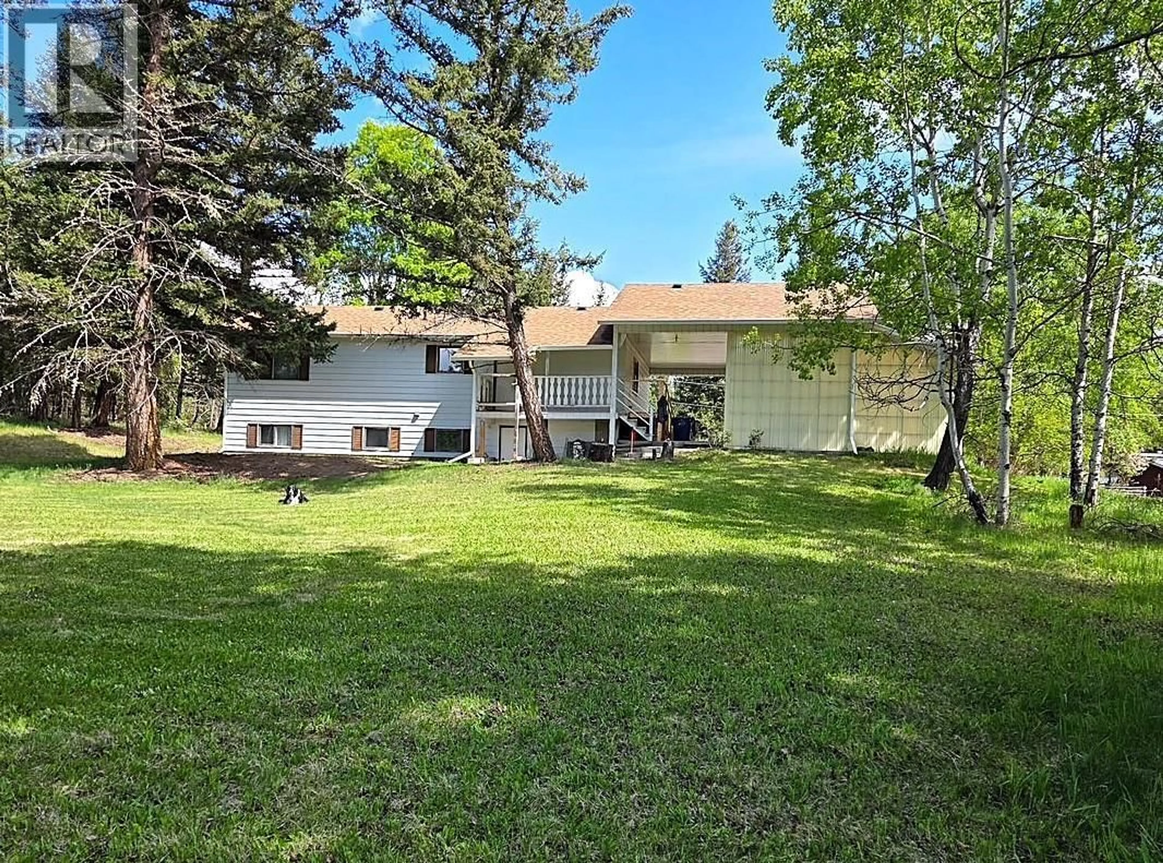 A pic from outside/outdoor area/front of a property/back of a property/a pic from drone, unknown for 5032 HANSEN COURT, 108 Mile Ranch British Columbia V0K2Z0