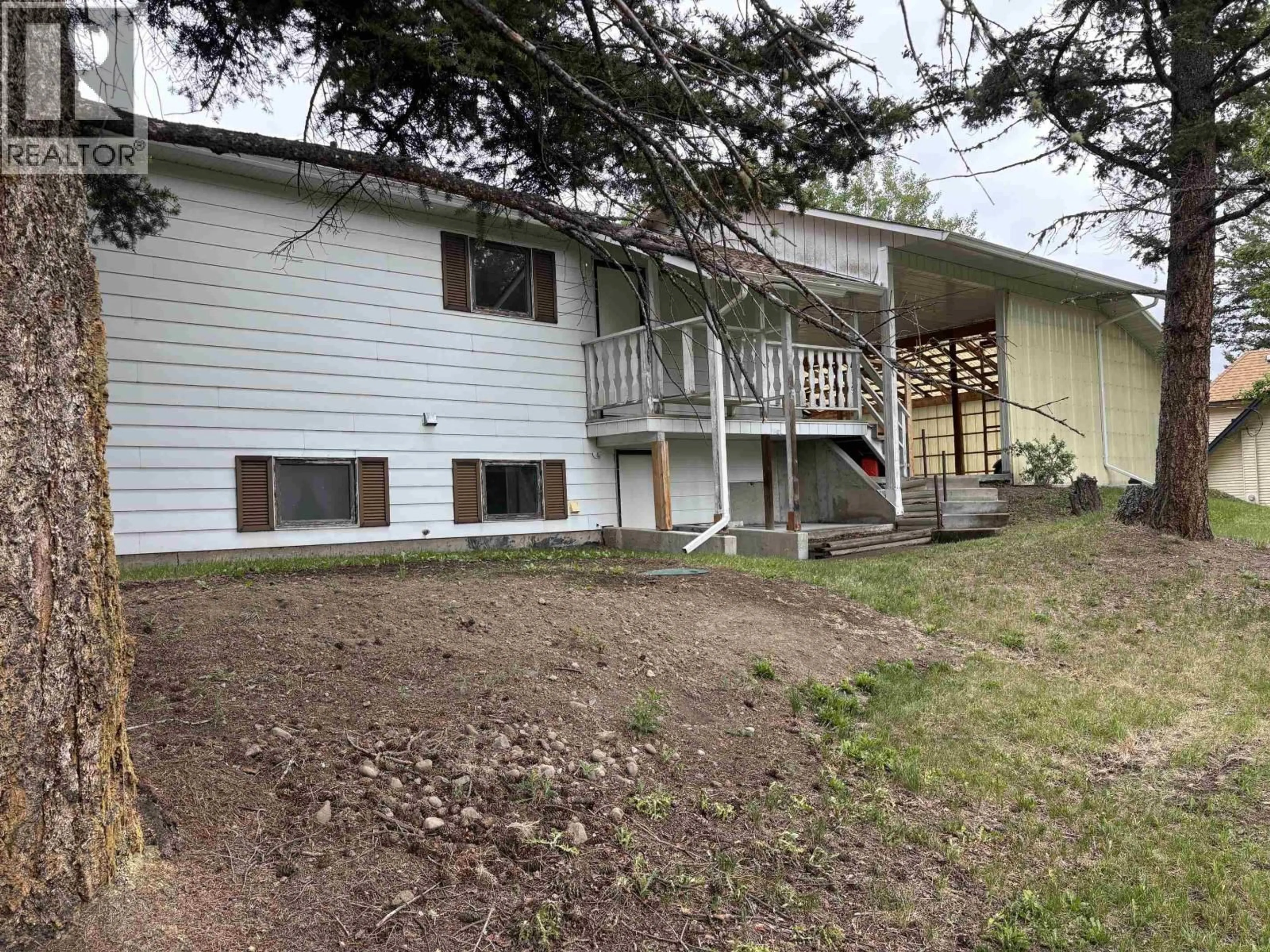 A pic from outside/outdoor area/front of a property/back of a property/a pic from drone, unknown for 5032 HANSEN COURT, 108 Mile Ranch British Columbia V0K2Z0