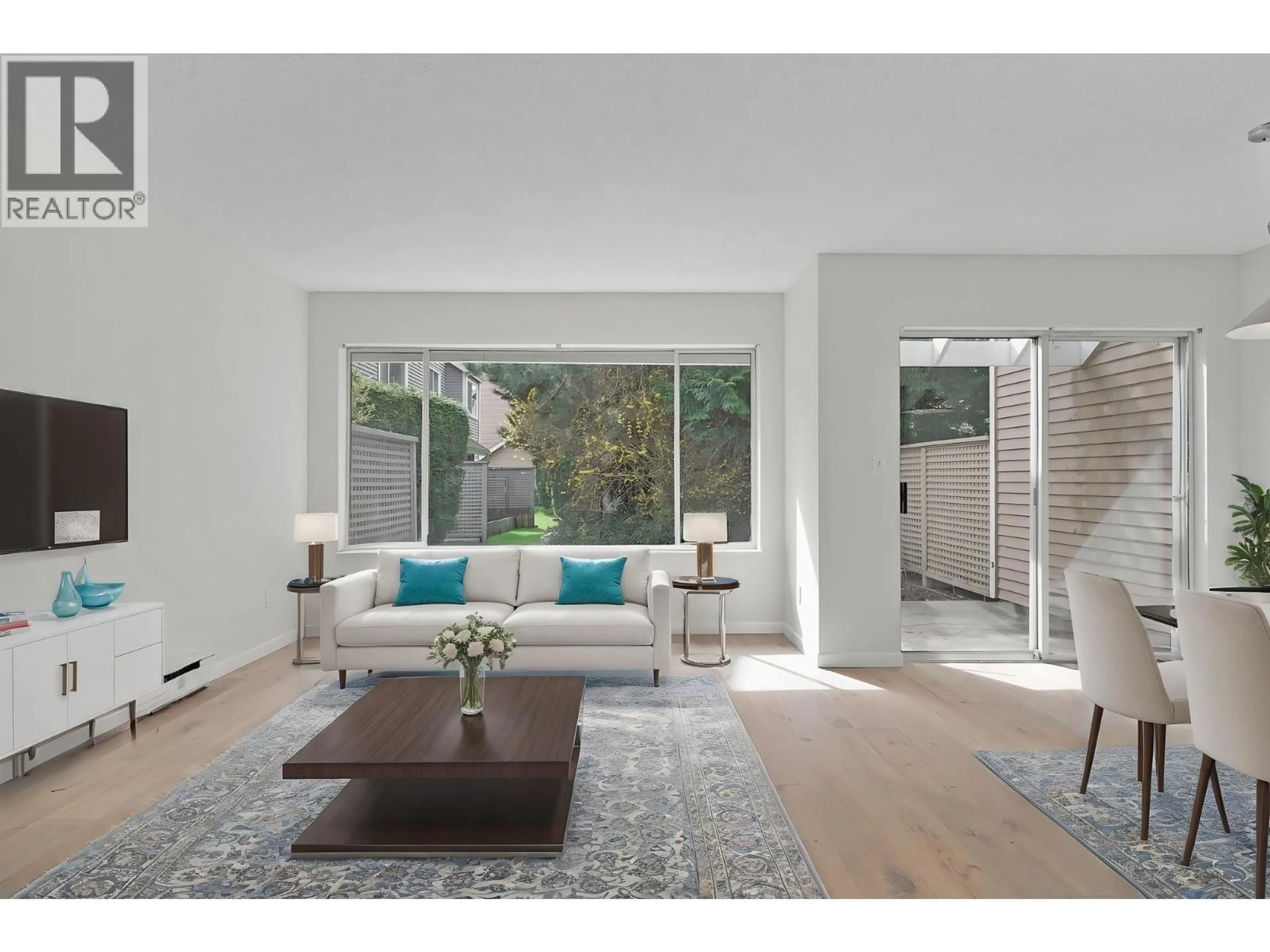 Living room with furniture, wood/laminate floor for 17 - 7400 MINORU BOULEVARD, Richmond British Columbia V6Y3J5