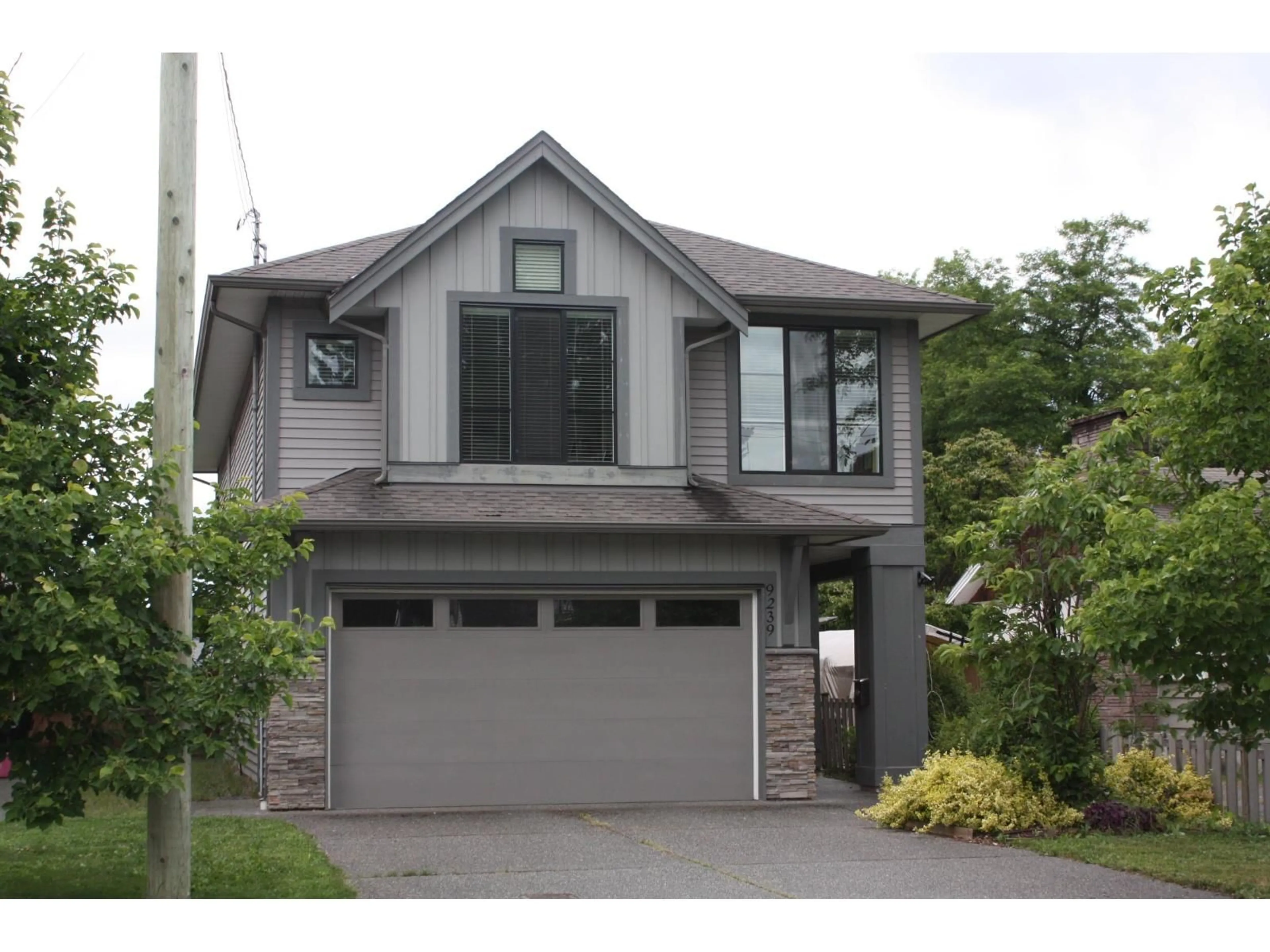 Home with vinyl exterior material, street for 9239 MCNAUGHT ROAD, Chilliwack British Columbia V2P6E7
