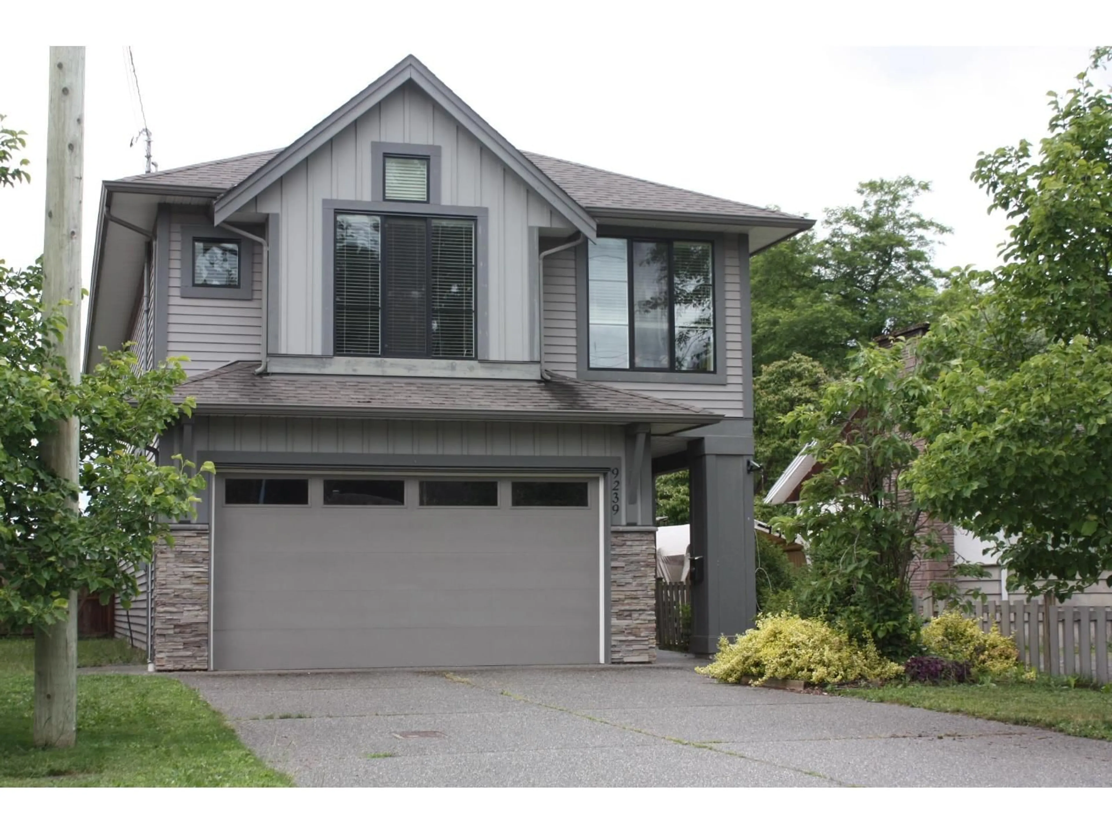 Home with brick exterior material, street for 9239 MCNAUGHT ROAD, Chilliwack British Columbia V2P6E7
