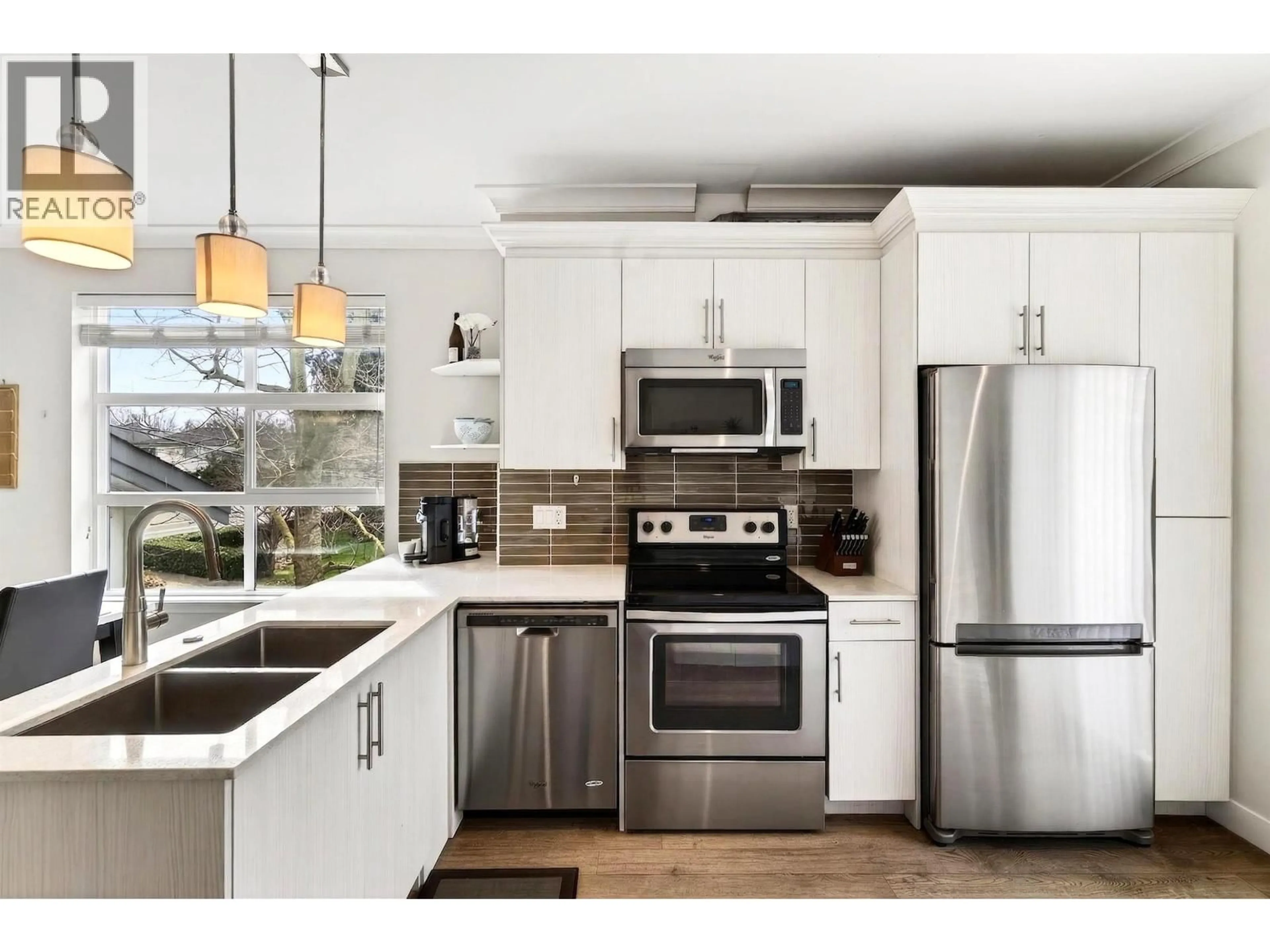Open concept kitchen, unknown for 14 - 4191 NO. 4 ROAD, Richmond British Columbia V6X2M2