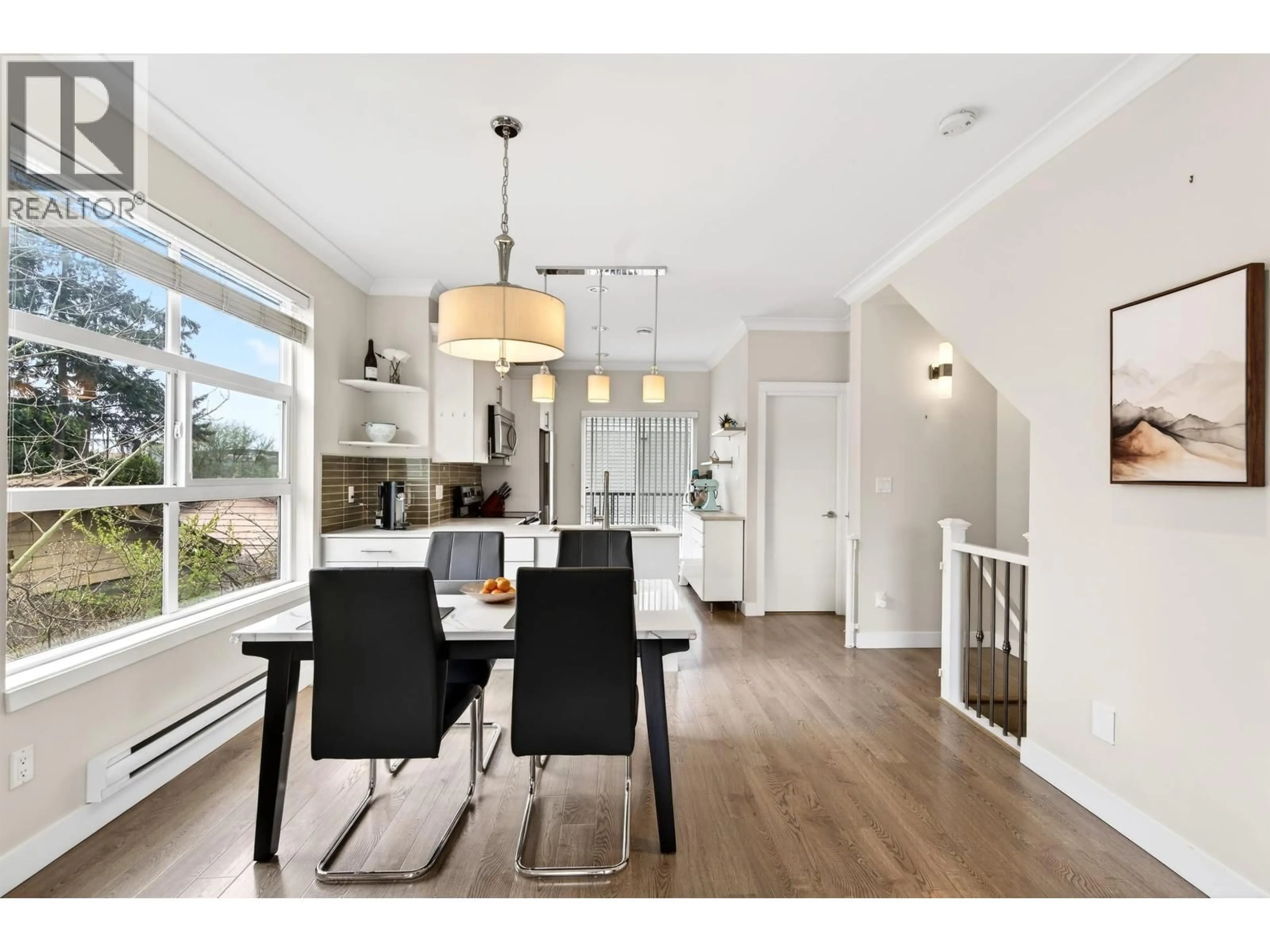 Open concept kitchen, wood/laminate floor for 14 - 4191 NO. 4 ROAD, Richmond British Columbia V6X2M2