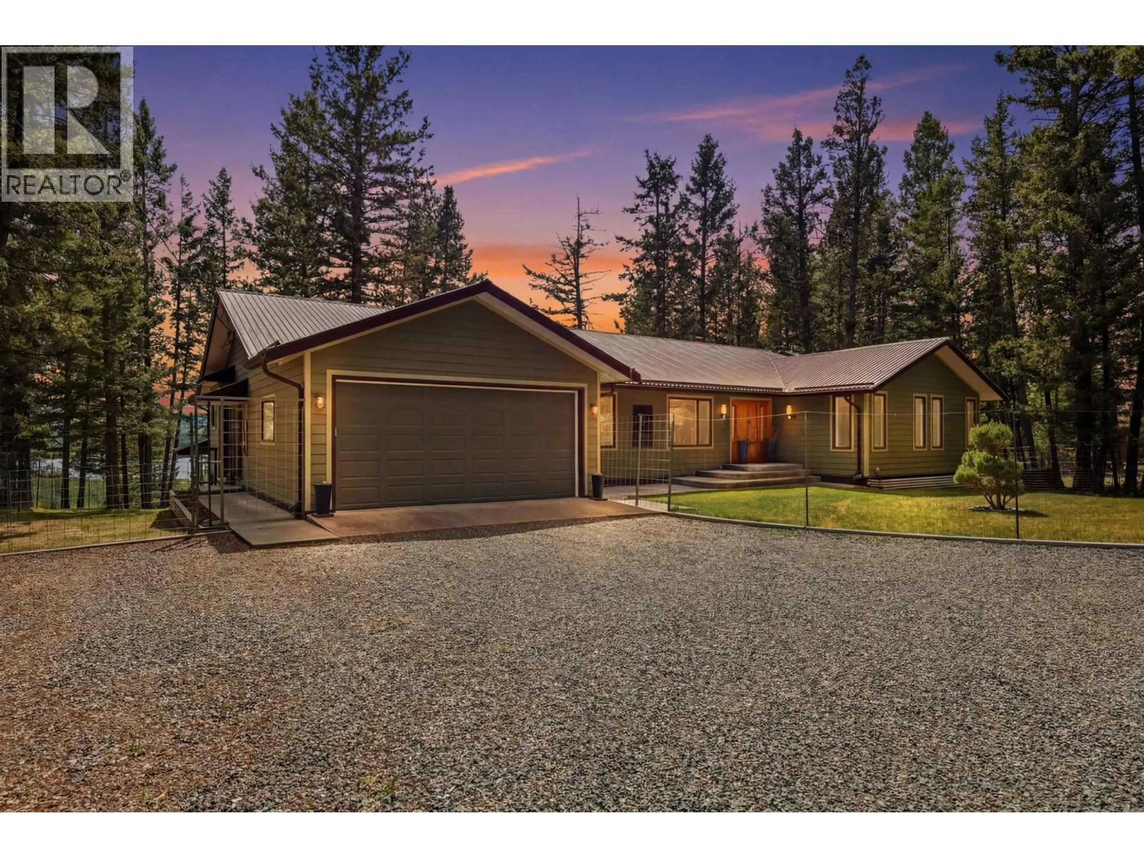 A pic from outside/outdoor area/front of a property/back of a property/a pic from drone, unknown for 5042 GLOINNZUN DRIVE, 100 Mile House British Columbia V0K2Z0