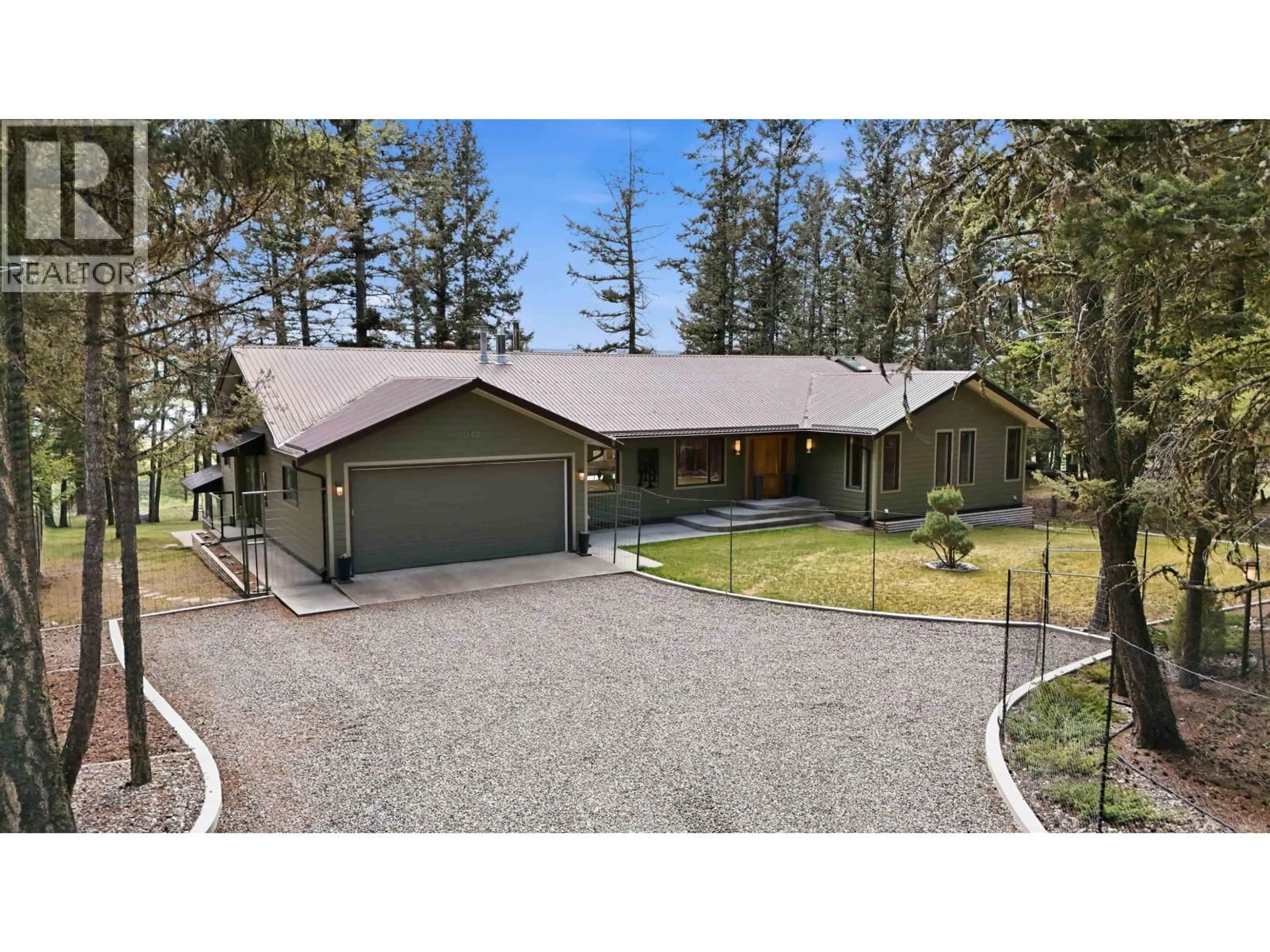 A pic from outside/outdoor area/front of a property/back of a property/a pic from drone, unknown for 5042 GLOINNZUN DRIVE, 100 Mile House British Columbia V0K2Z0