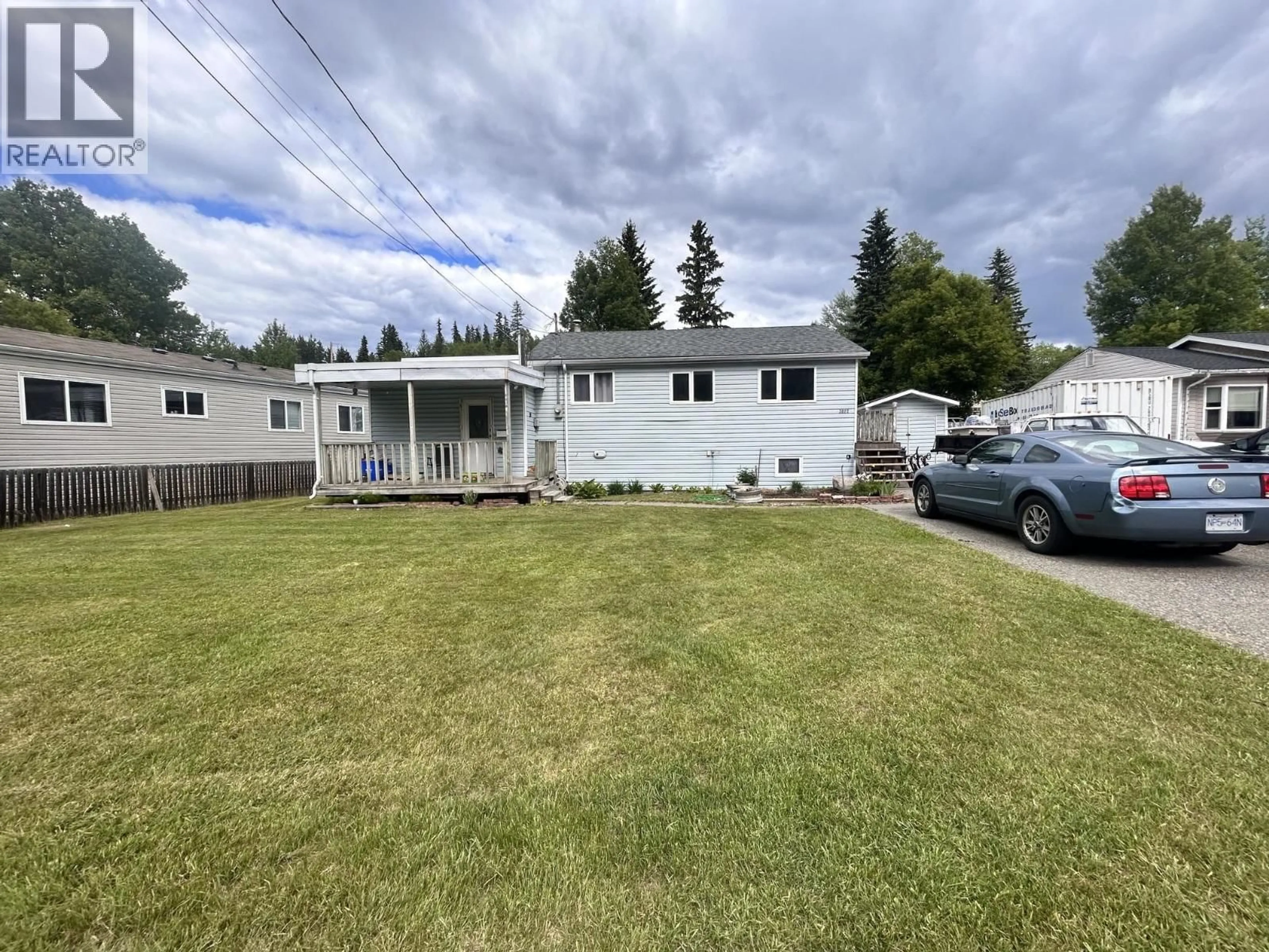 A pic from outside/outdoor area/front of a property/back of a property/a pic from drone, street for 3022 HART HIGHWAY, Prince George British Columbia V2K3X9