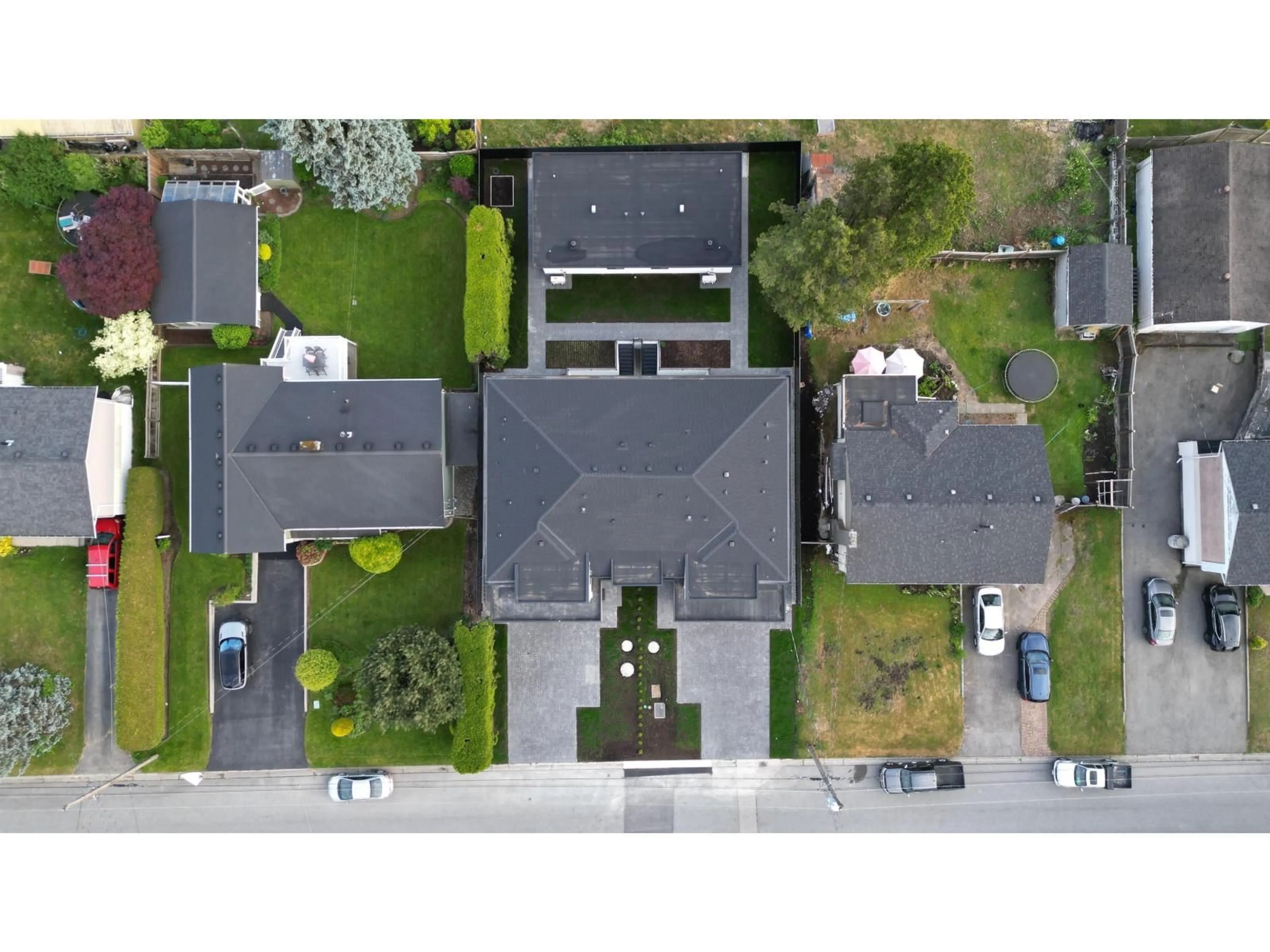 A pic from outside/outdoor area/front of a property/back of a property/a pic from drone, street for 11420 72A AVENUE, Delta British Columbia V4C1A6