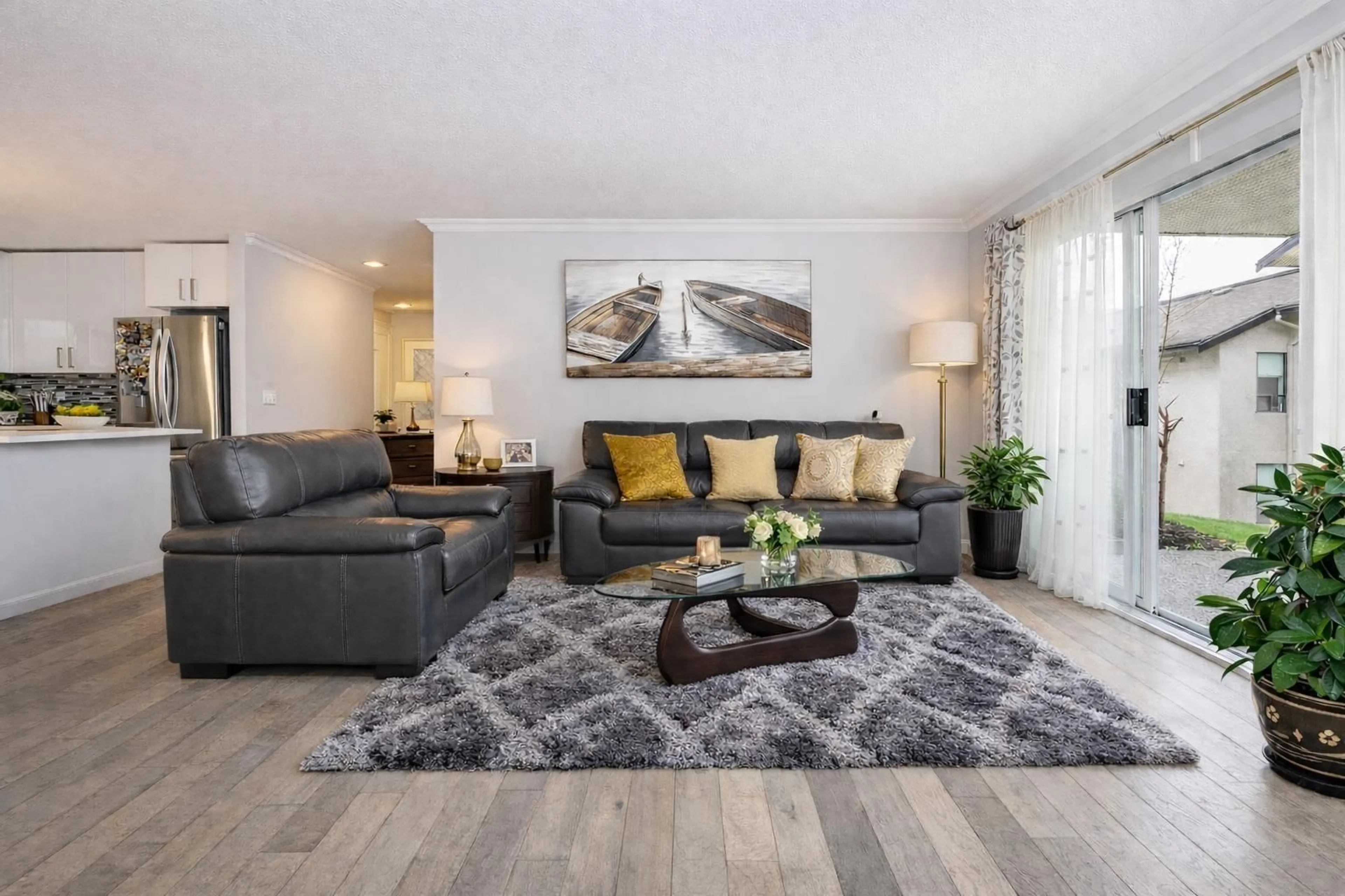 Living room with furniture, wood/laminate floor for 104 - 1441 BLACKWOOD STREET, White Rock British Columbia V4B3V6