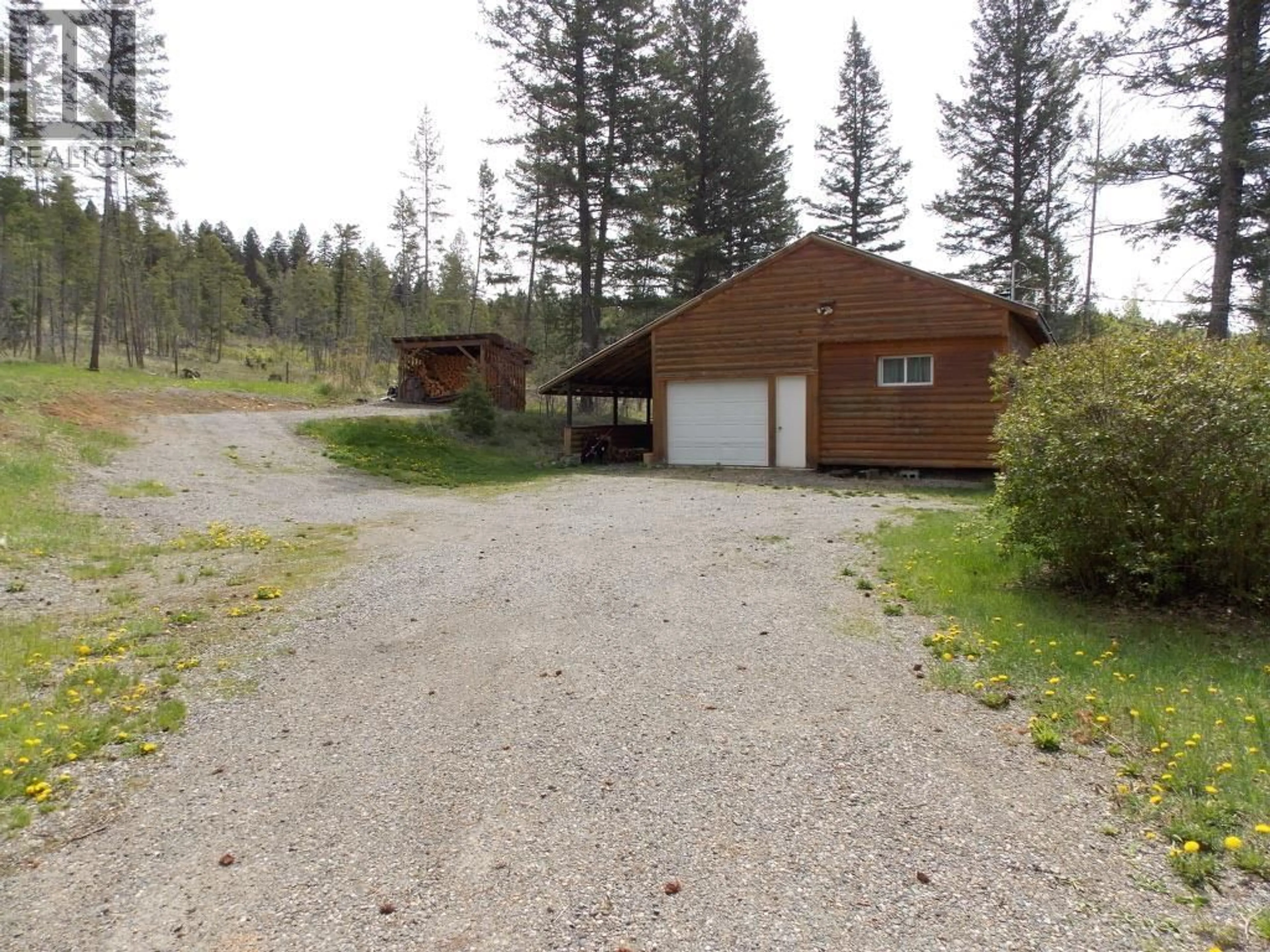A pic from outside/outdoor area/front of a property/back of a property/a pic from drone, street for 2337 CHIMNEY LAKE ROAD, Williams Lake British Columbia V2G4W2