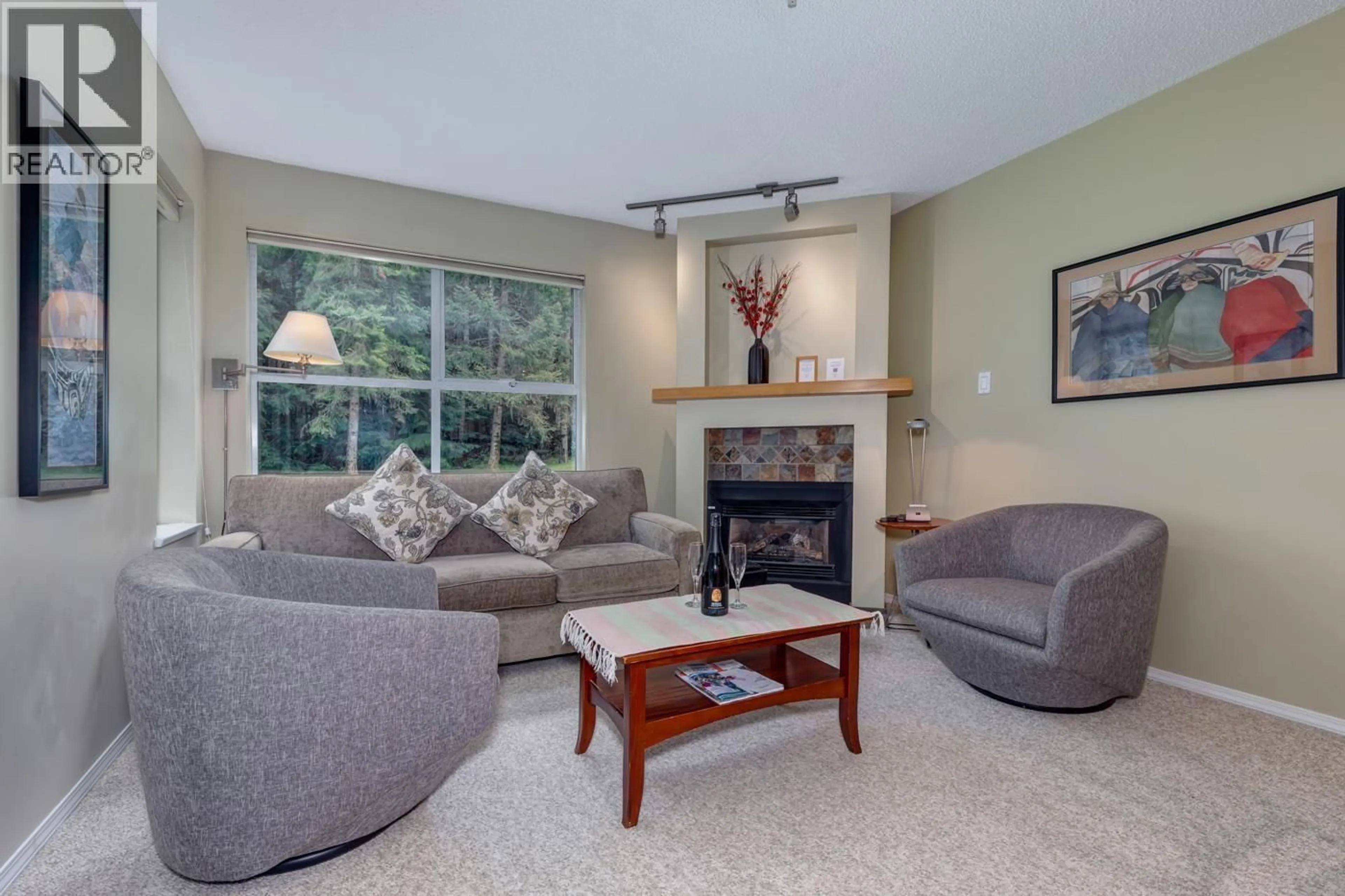 Living room with furniture, unknown for 207 - 4749 SPEARHEAD DRIVE, Whistler British Columbia V8E1E9