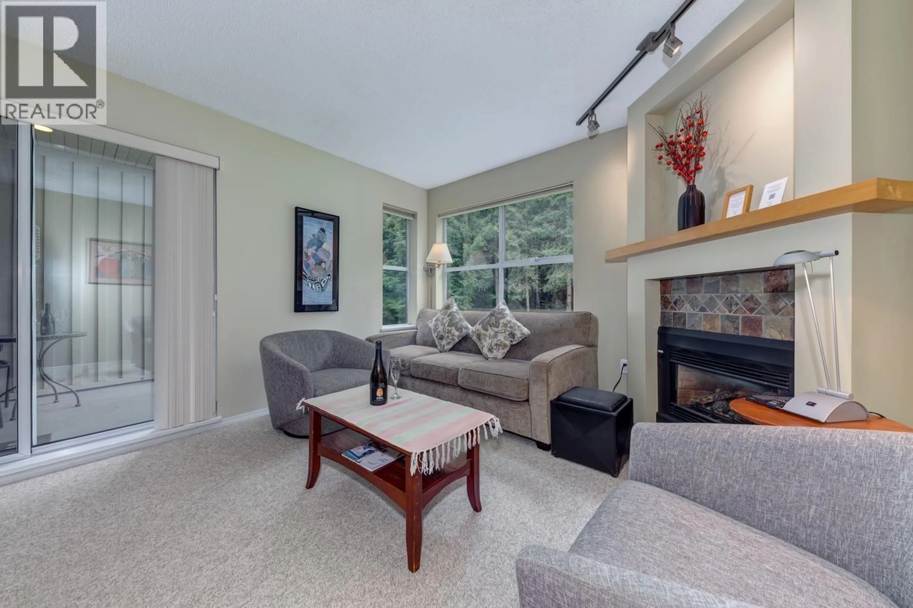 Living room with furniture, unknown for 207 - 4749 SPEARHEAD DRIVE, Whistler British Columbia V8E1E9