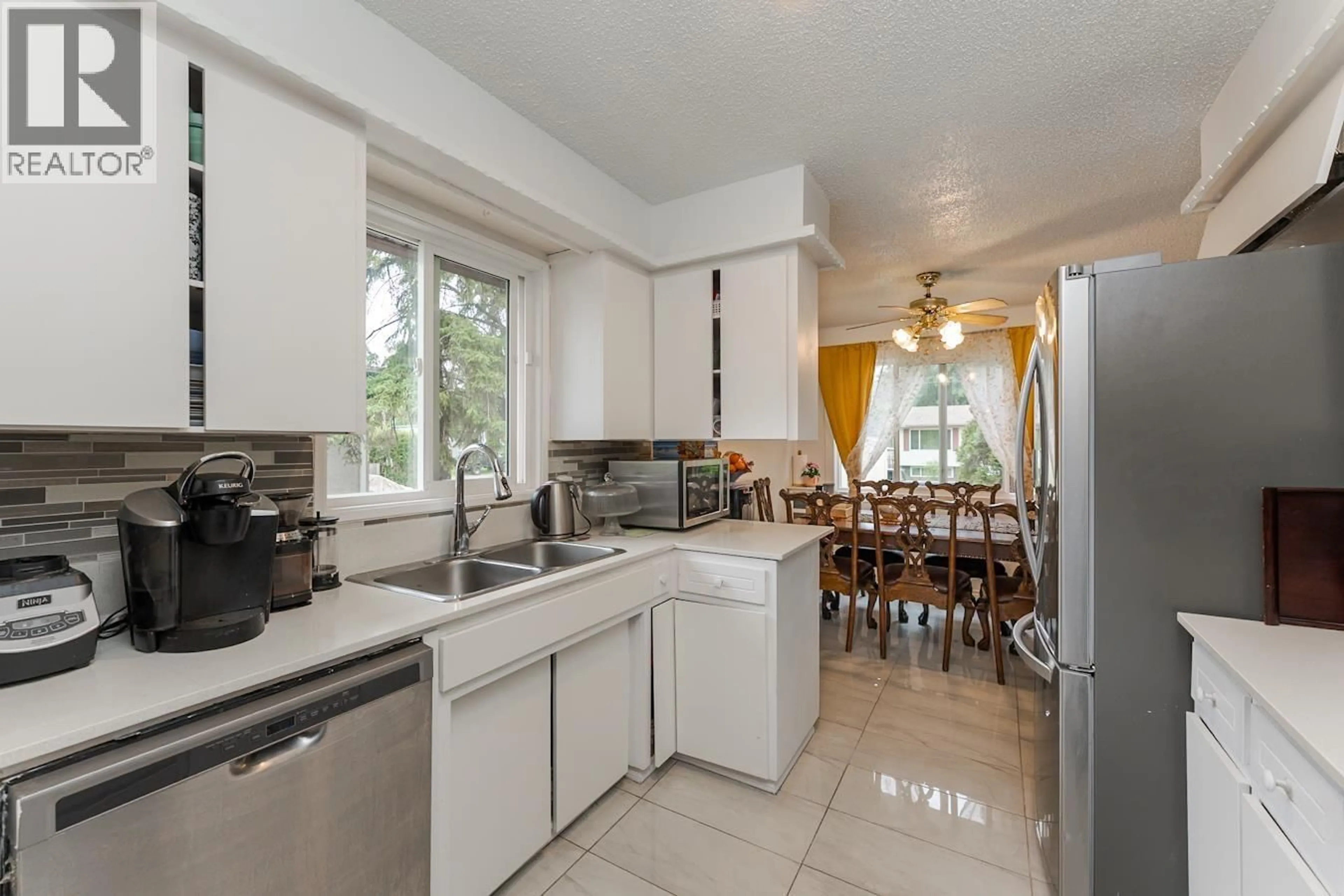 Open concept kitchen, ceramic/tile floor for 2613 OAK STREET, Prince George British Columbia V2L2A5