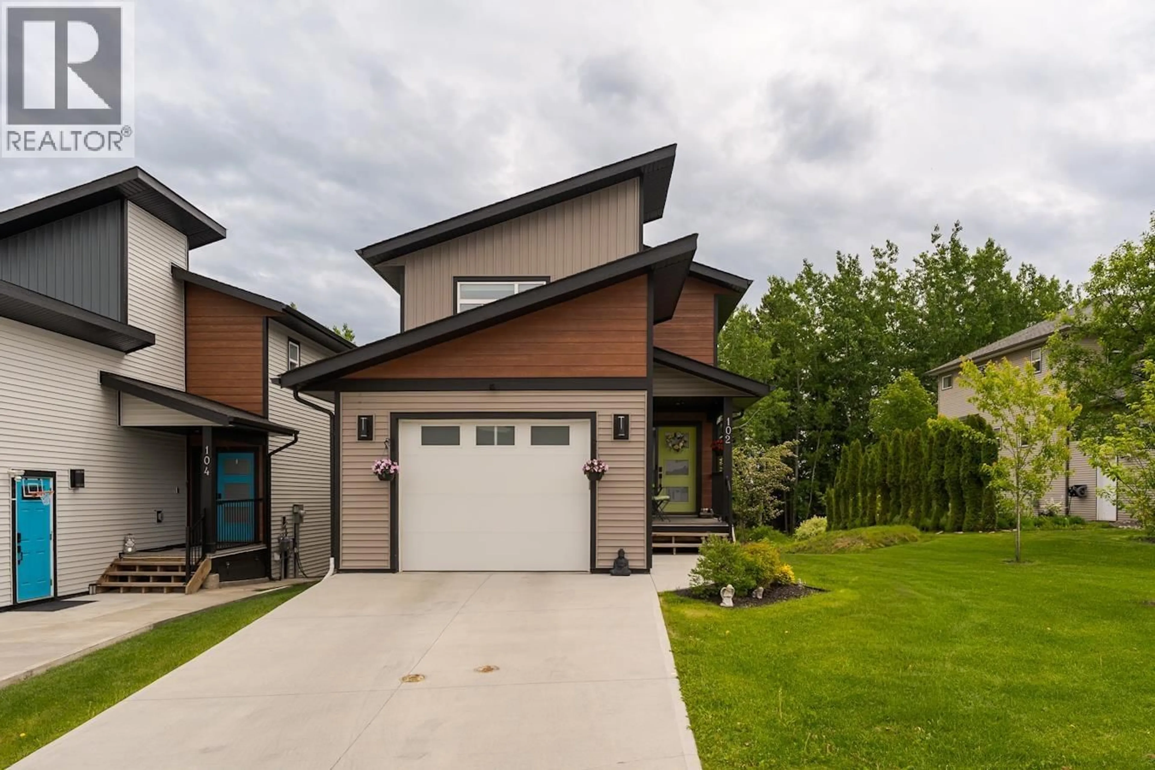 Home with brick exterior material, street for 102 - 6664 WESTMOUNT DRIVE, Prince George British Columbia V2N6R3