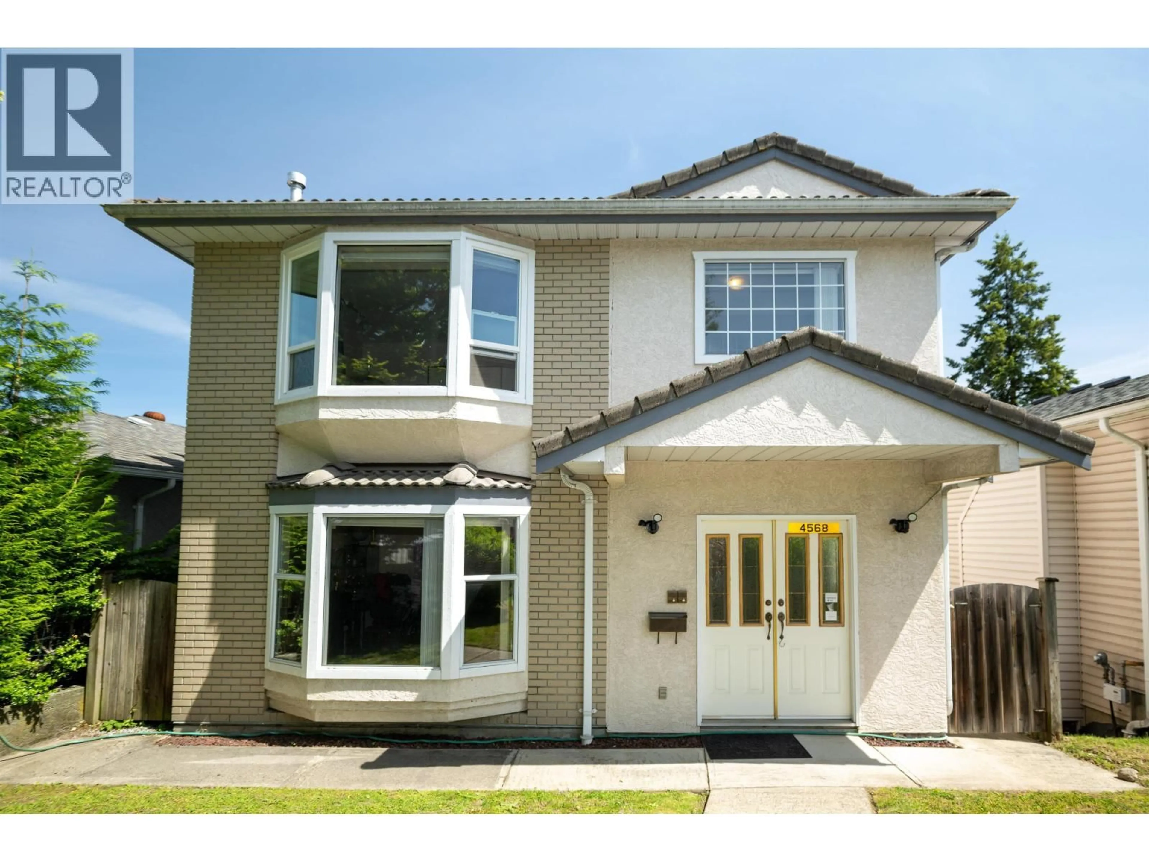 Home with vinyl exterior material, street for 4568 HOY STREET, Vancouver British Columbia V5R4N4
