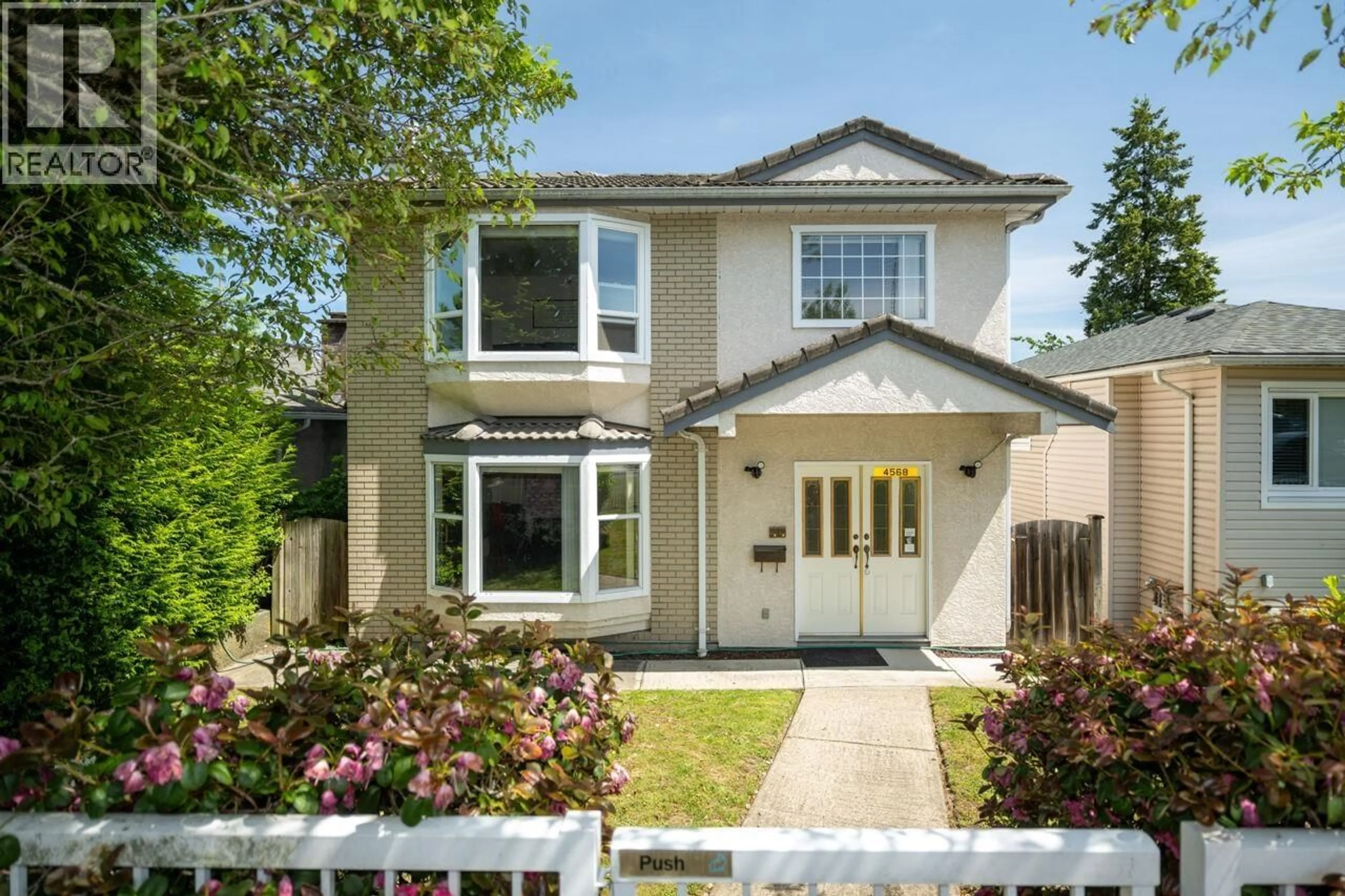 Home with vinyl exterior material, street for 4568 HOY STREET, Vancouver British Columbia V5R4N4