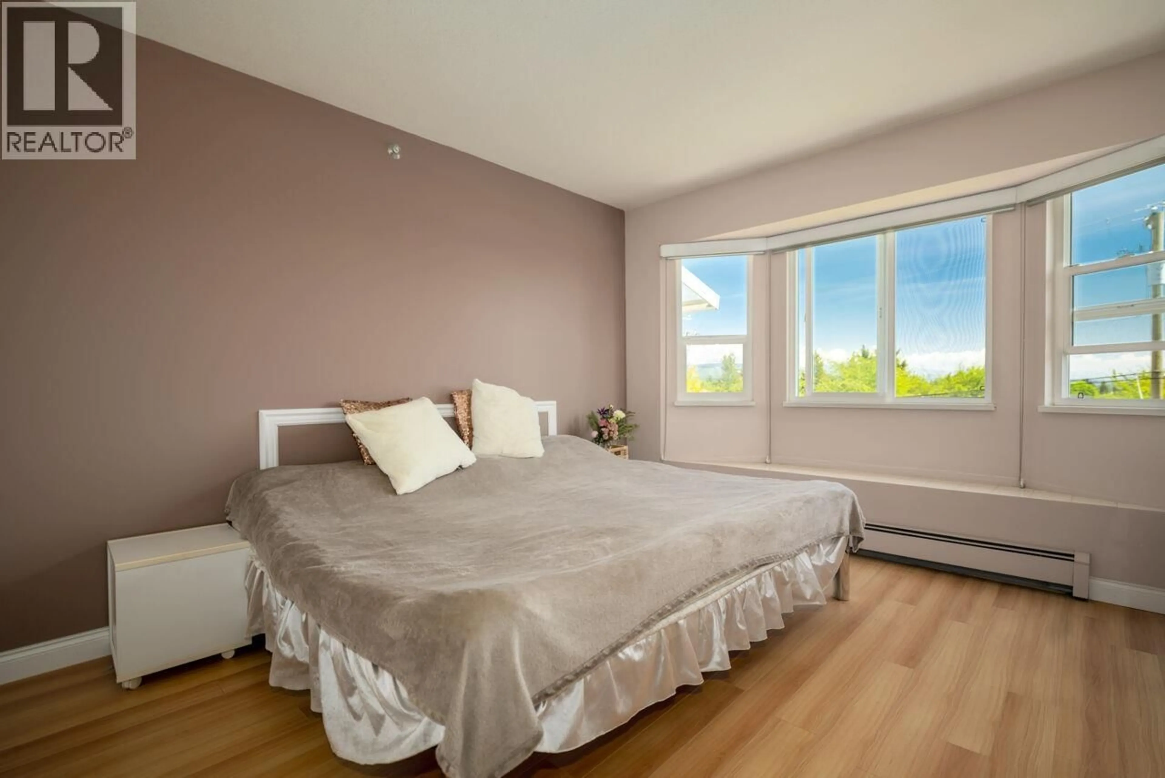 Bedroom with bed, wood/laminate floor for 4568 HOY STREET, Vancouver British Columbia V5R4N4