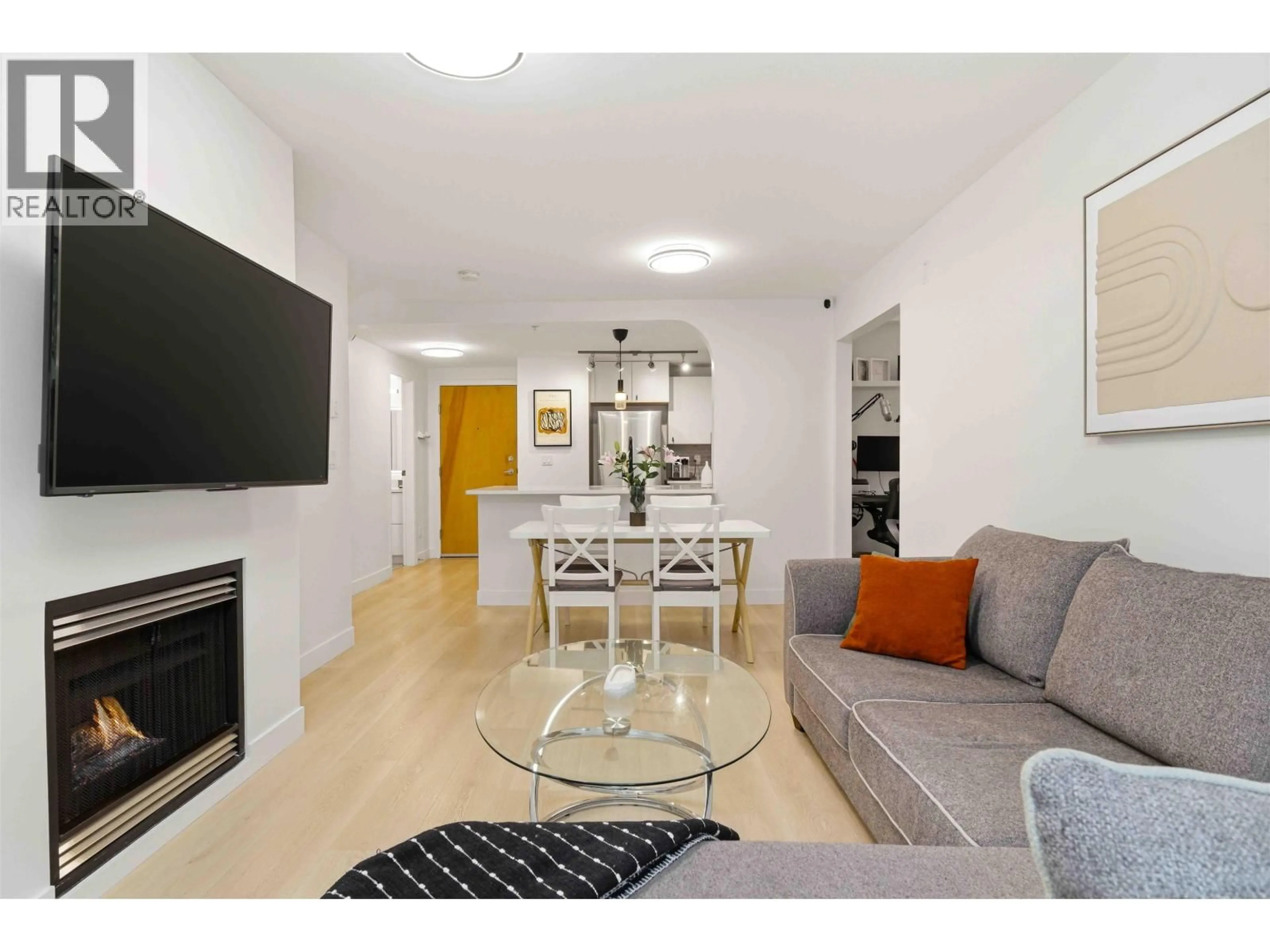 Living room with furniture, unknown for 201 - 1111 LYNN VALLEY ROAD, North Vancouver British Columbia V7J3V4