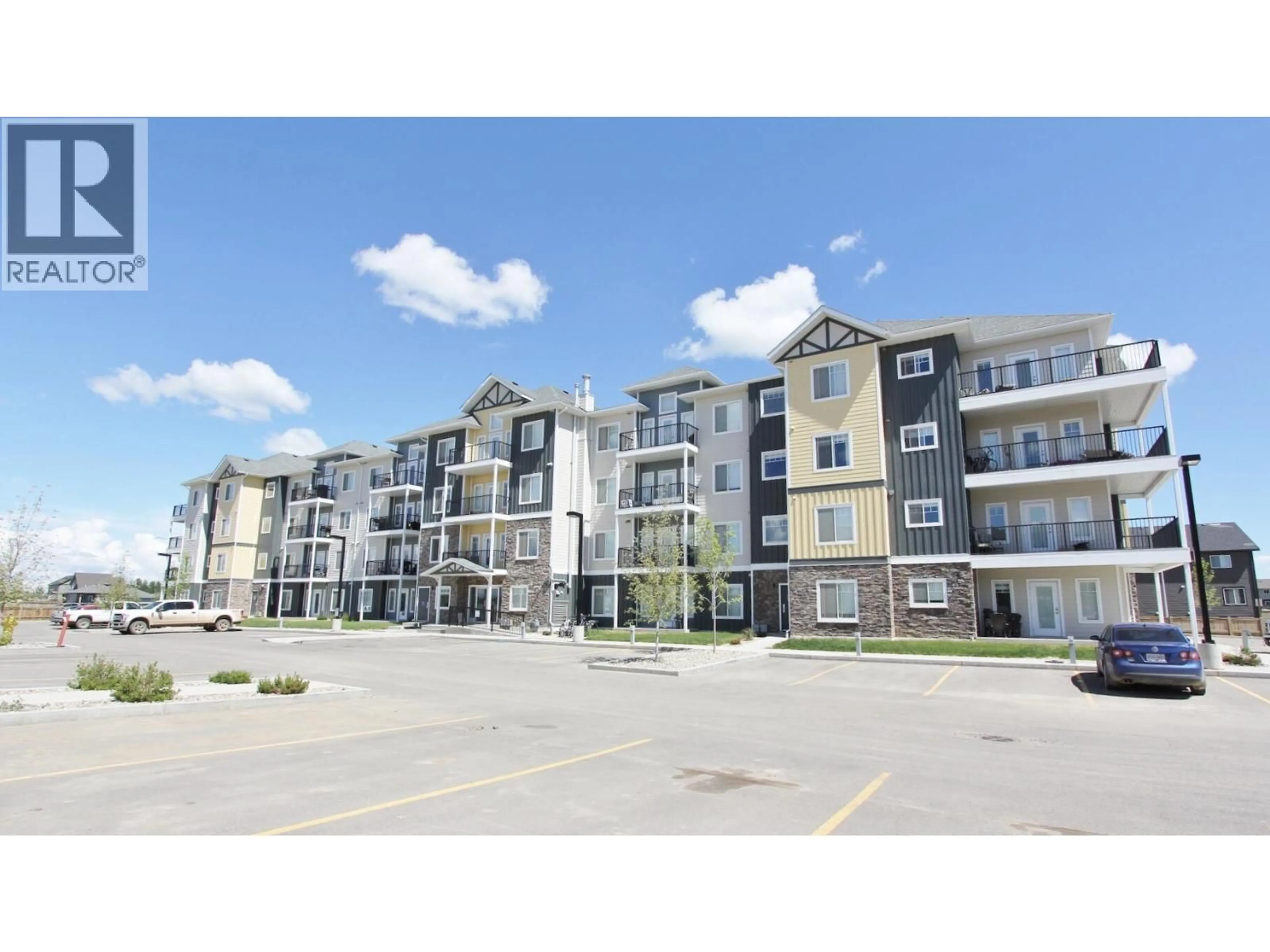 A pic from outside/outdoor area/front of a property/back of a property/a pic from drone, building for 112 - 11203 105 AVENUE, Fort St. John British Columbia V1J0L3