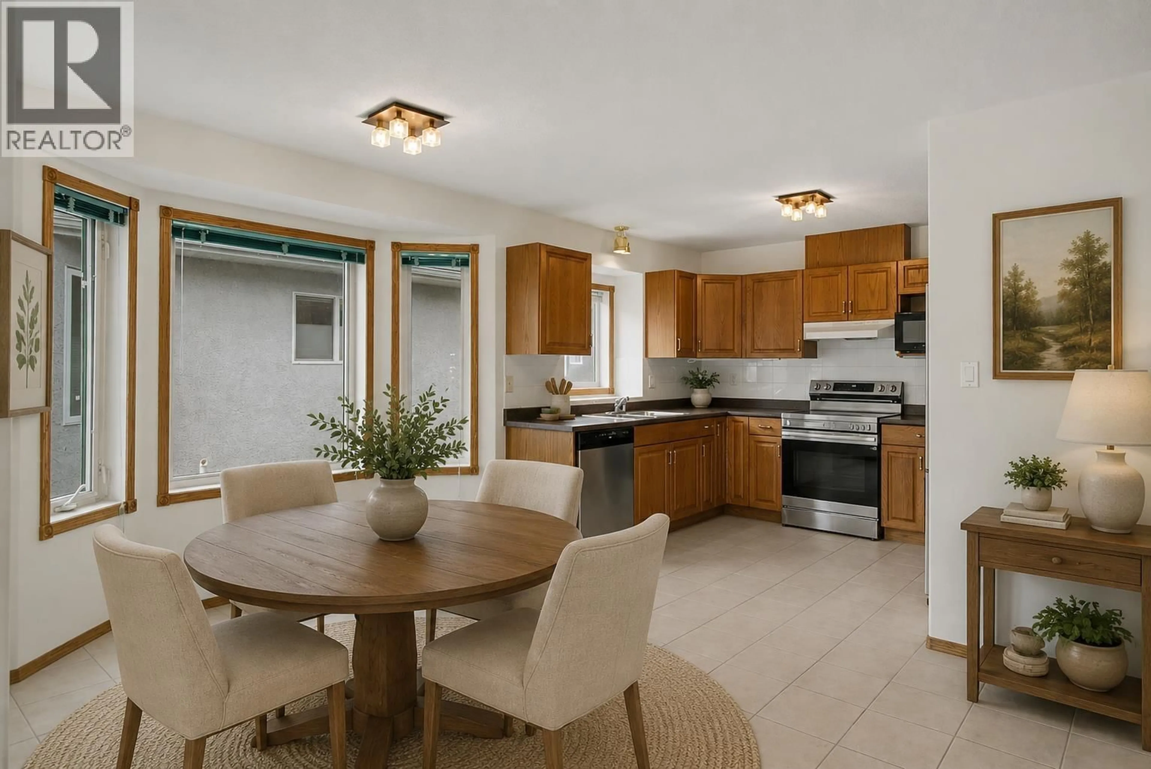 Open concept kitchen, ceramic/tile floor for 108 - 6450 DAWSON ROAD, Prince George British Columbia V2K5Y4
