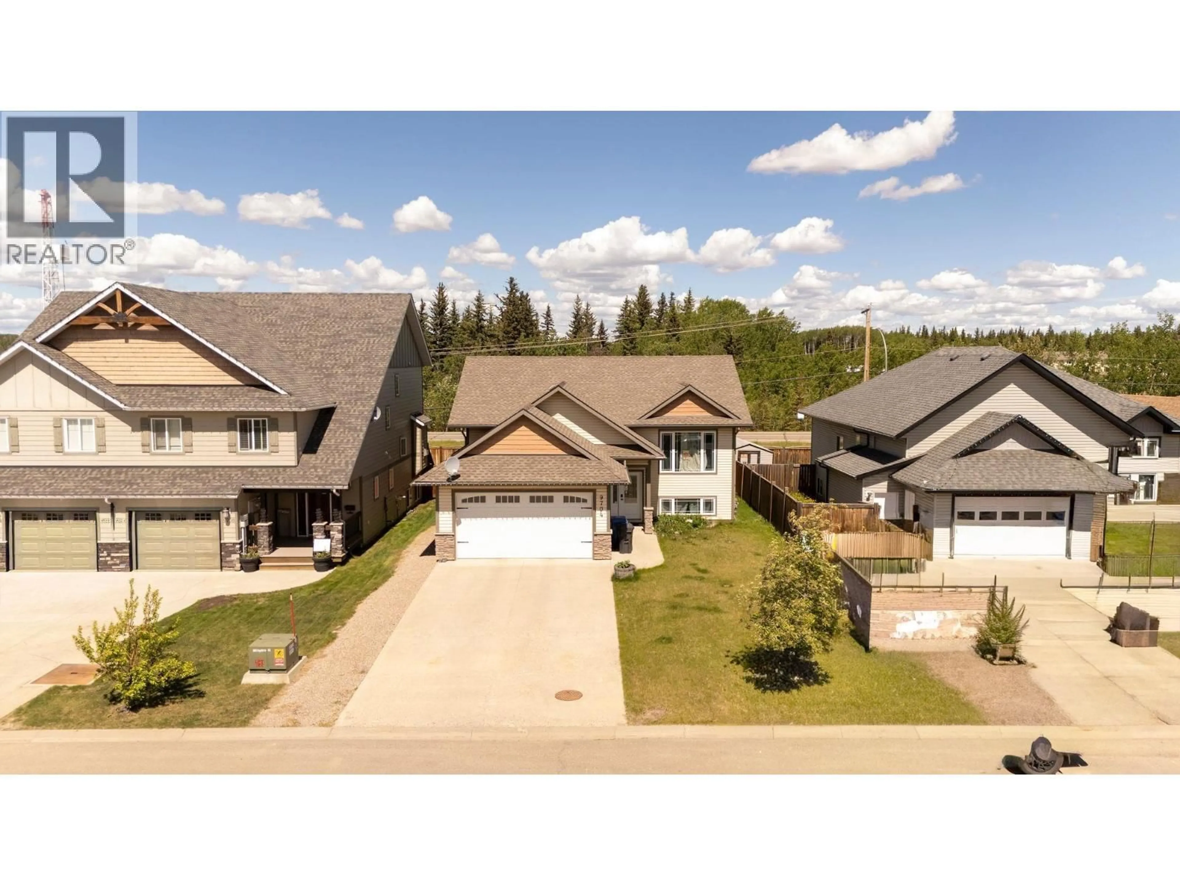 A pic from outside/outdoor area/front of a property/back of a property/a pic from drone, street for 9704 118 AVENUE, Fort St. John British Columbia V1J0E9