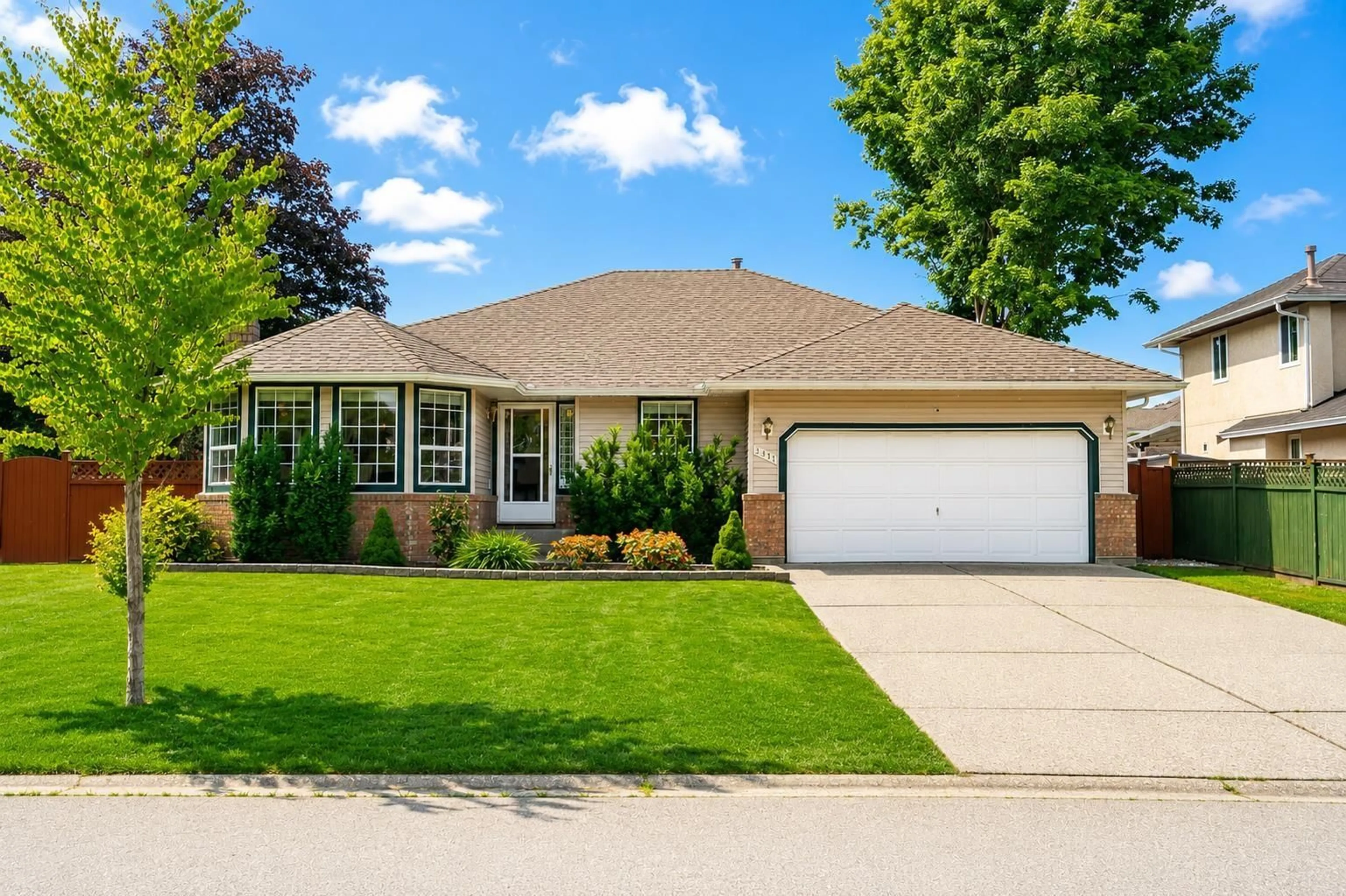 Home with vinyl exterior material, street for 9411 162 STREET, Surrey British Columbia V4N3A2