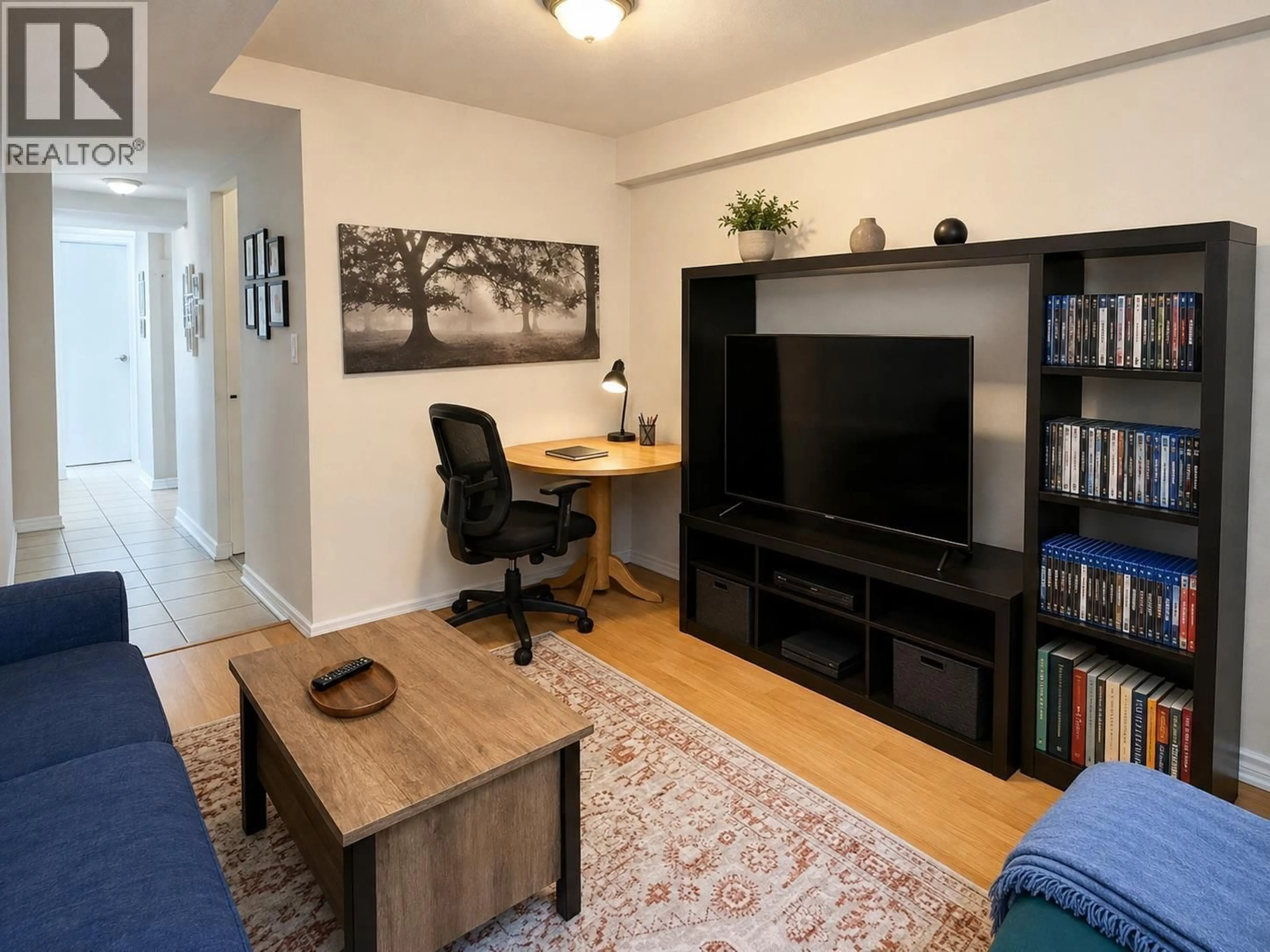 Living room with furniture, wood/laminate floor for 5569 CULLODEN STREET, Vancouver British Columbia V5W3R9