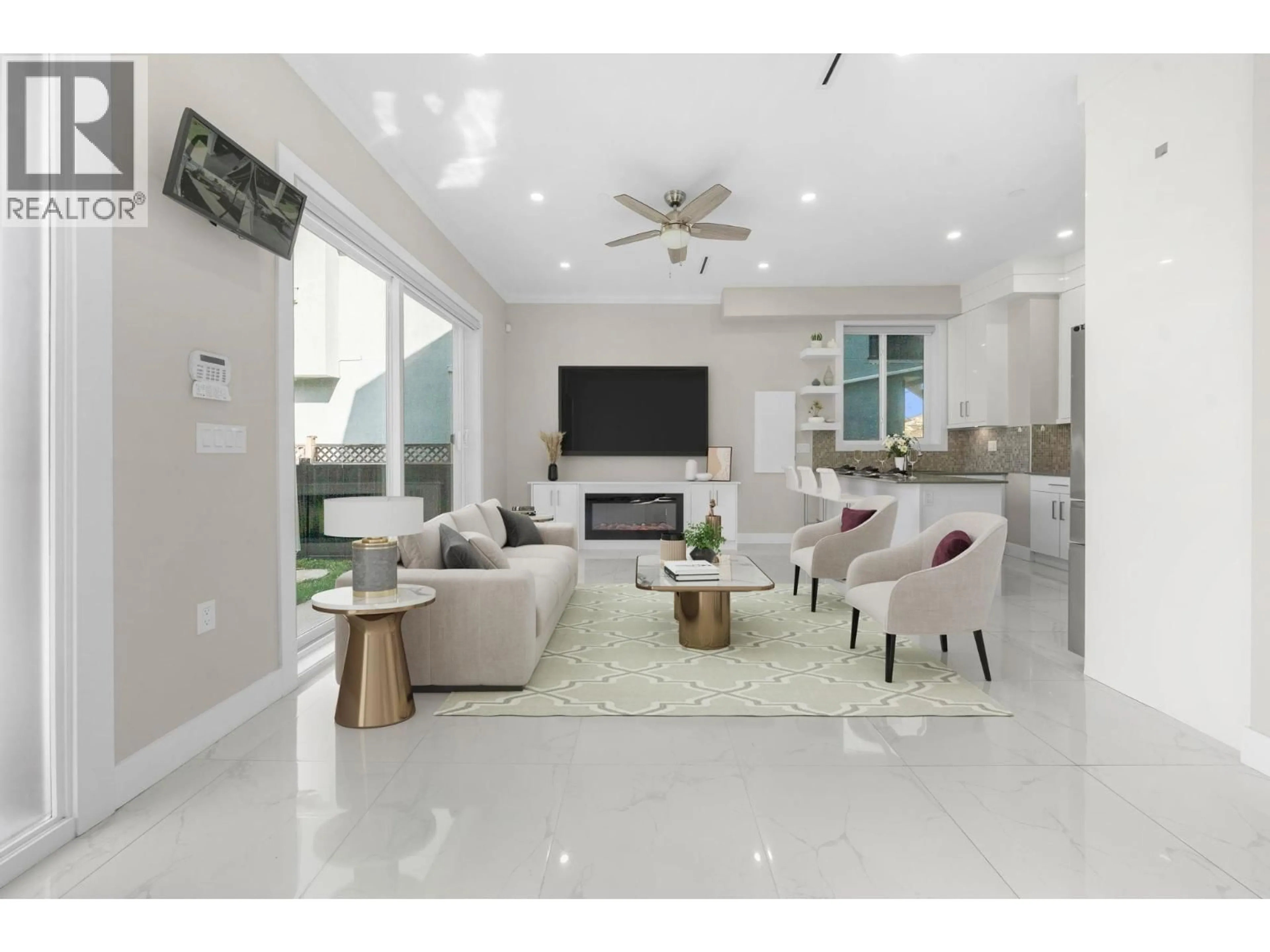 Living room with furniture, ceramic/tile floor for 6692 NANAIMO STREET, Vancouver British Columbia V5P4L2