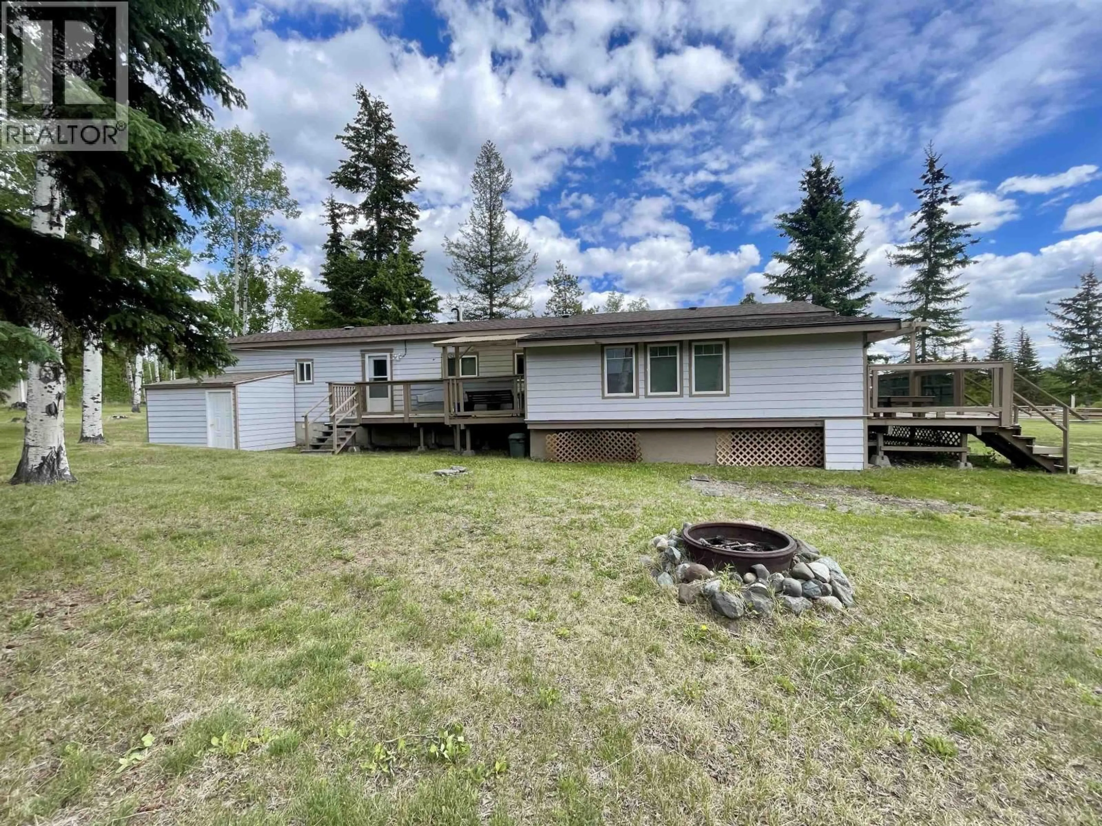 A pic from outside/outdoor area/front of a property/back of a property/a pic from drone, unknown for 5749 GREEN LAKE N ROAD, 70 Mile House British Columbia V0K2K0