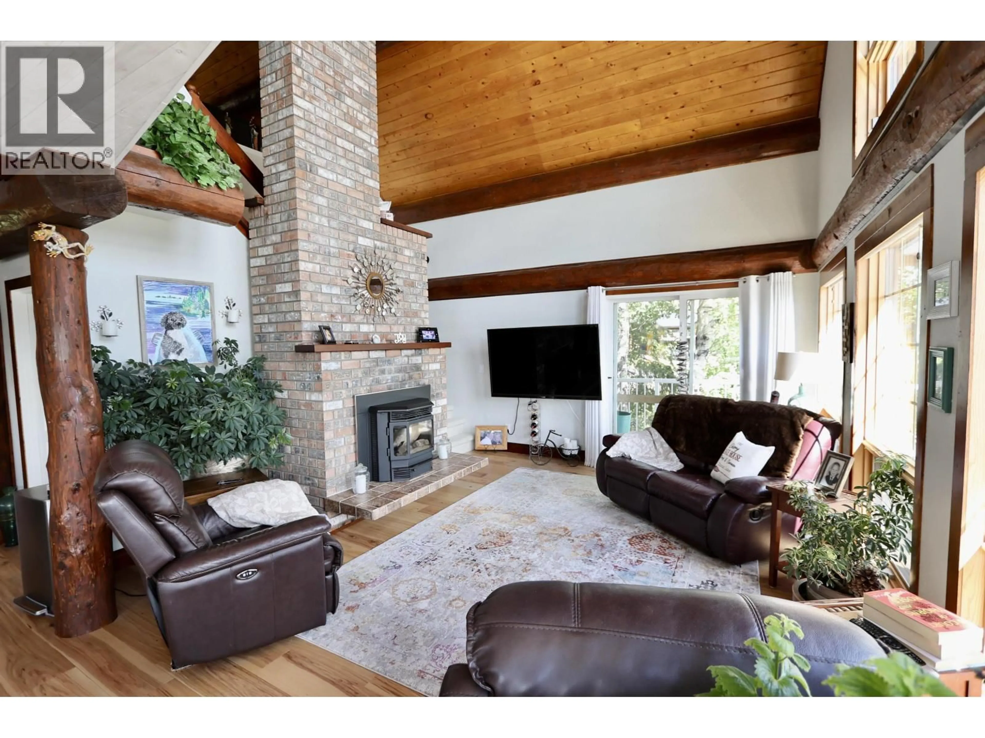 Living room with furniture, wood/laminate floor for 55035 JARDINE ROAD, Vanderhoof British Columbia V0J3A3