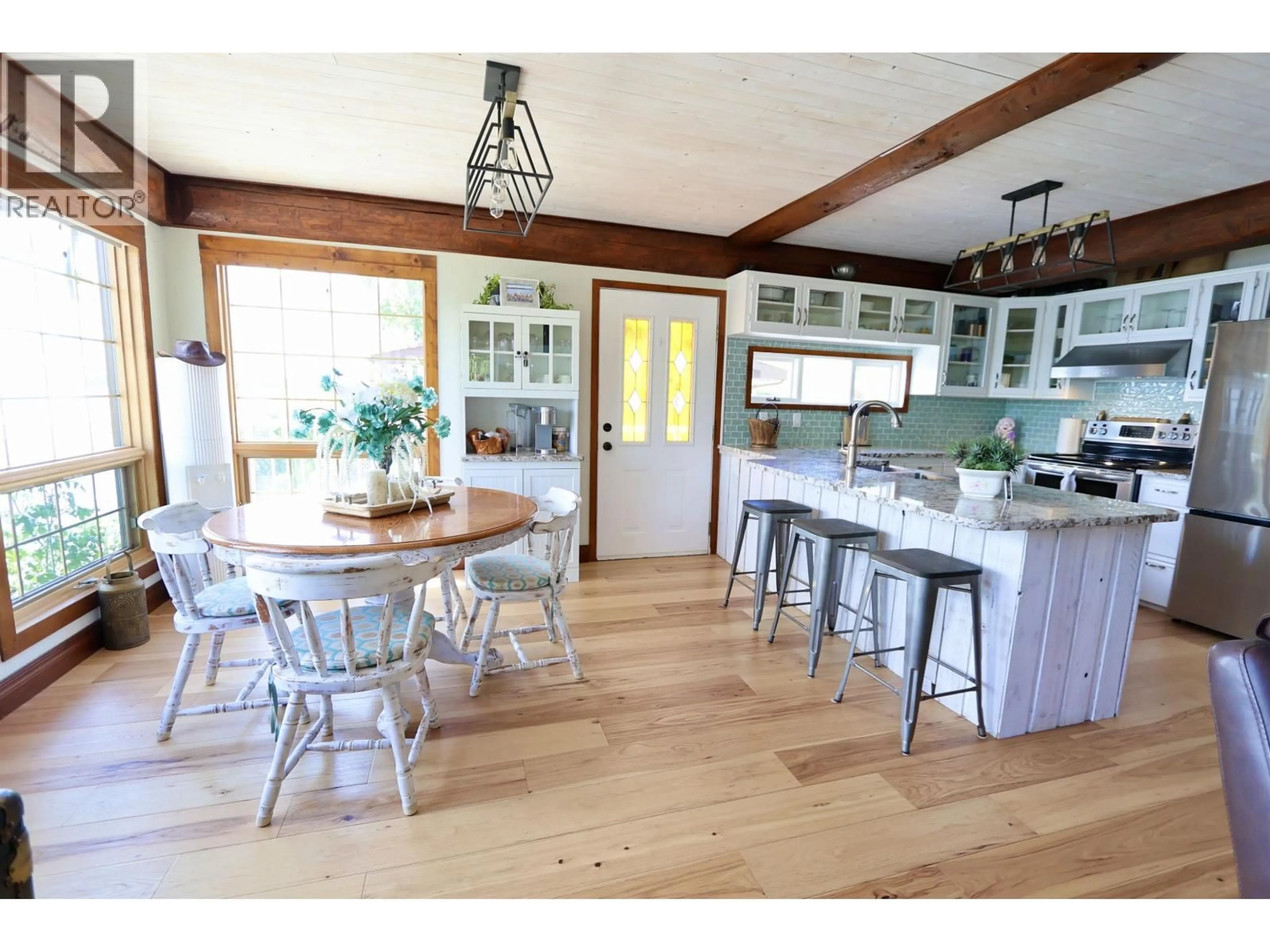 Open concept kitchen, wood/laminate floor for 55035 JARDINE ROAD, Vanderhoof British Columbia V0J3A3
