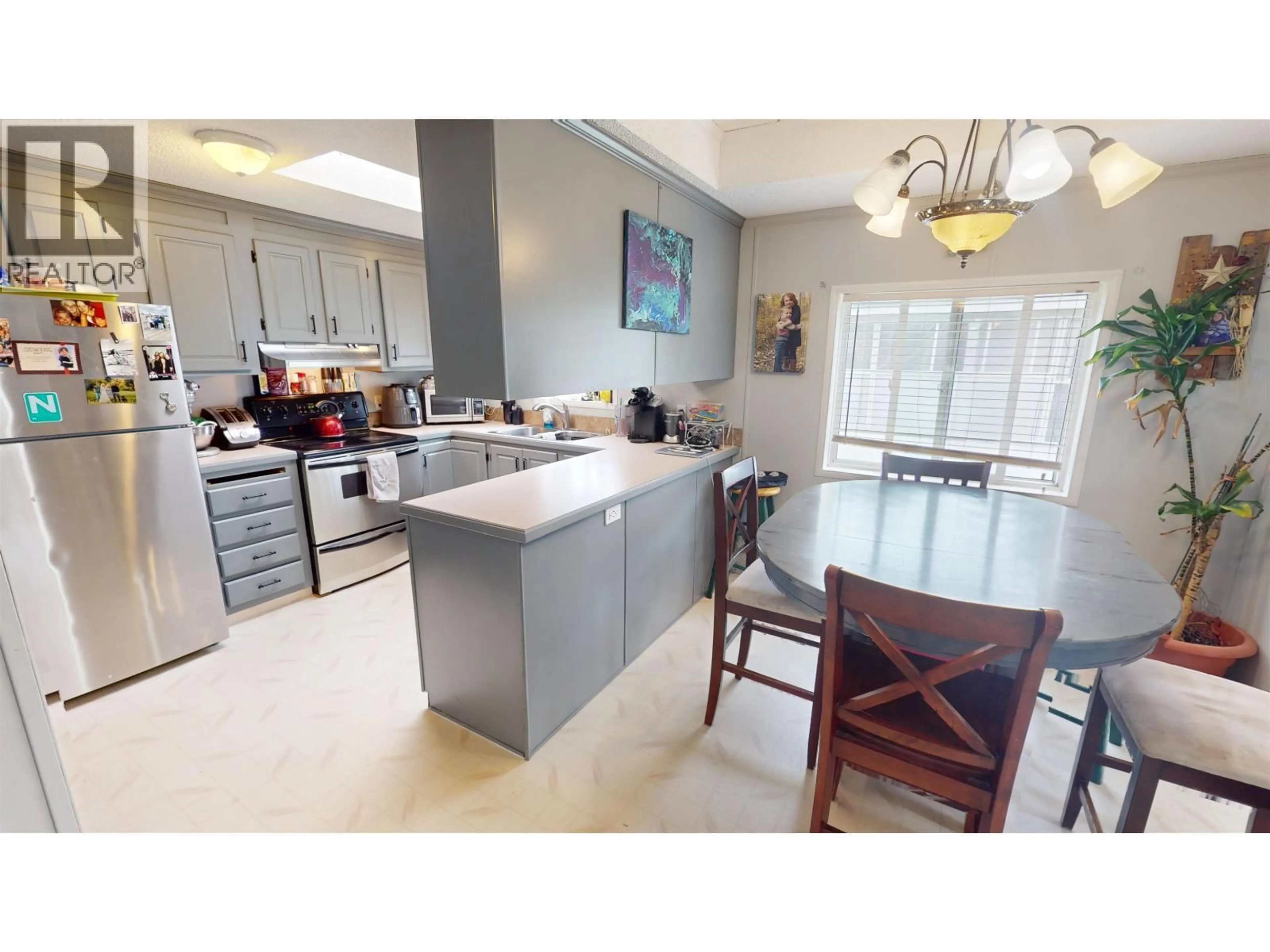 Open concept kitchen, ceramic/tile floor for 32 - 602 ELM STREET, Quesnel British Columbia V2J3X1