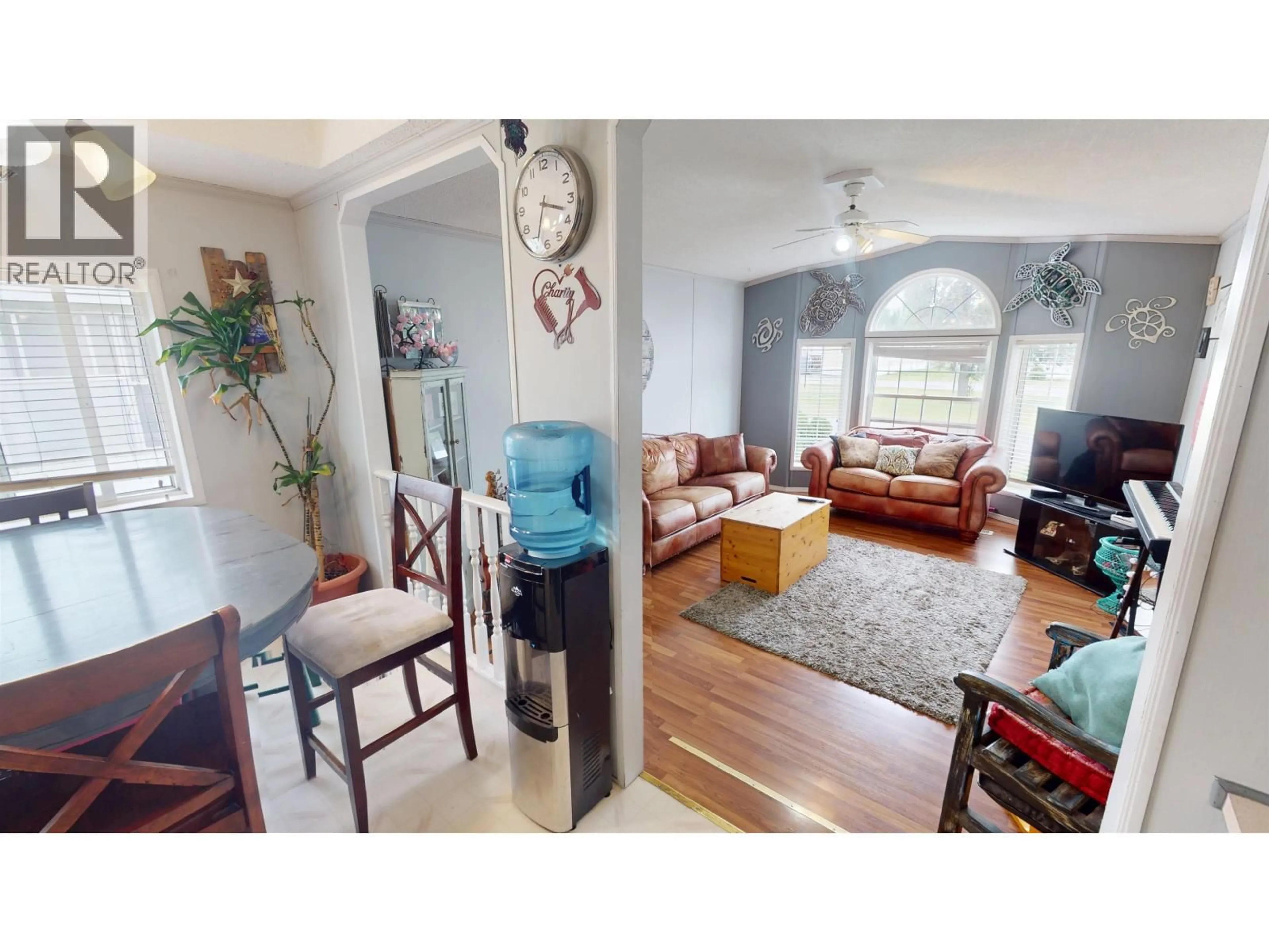 Living room with furniture, wood/laminate floor for 32 - 602 ELM STREET, Quesnel British Columbia V2J3X1