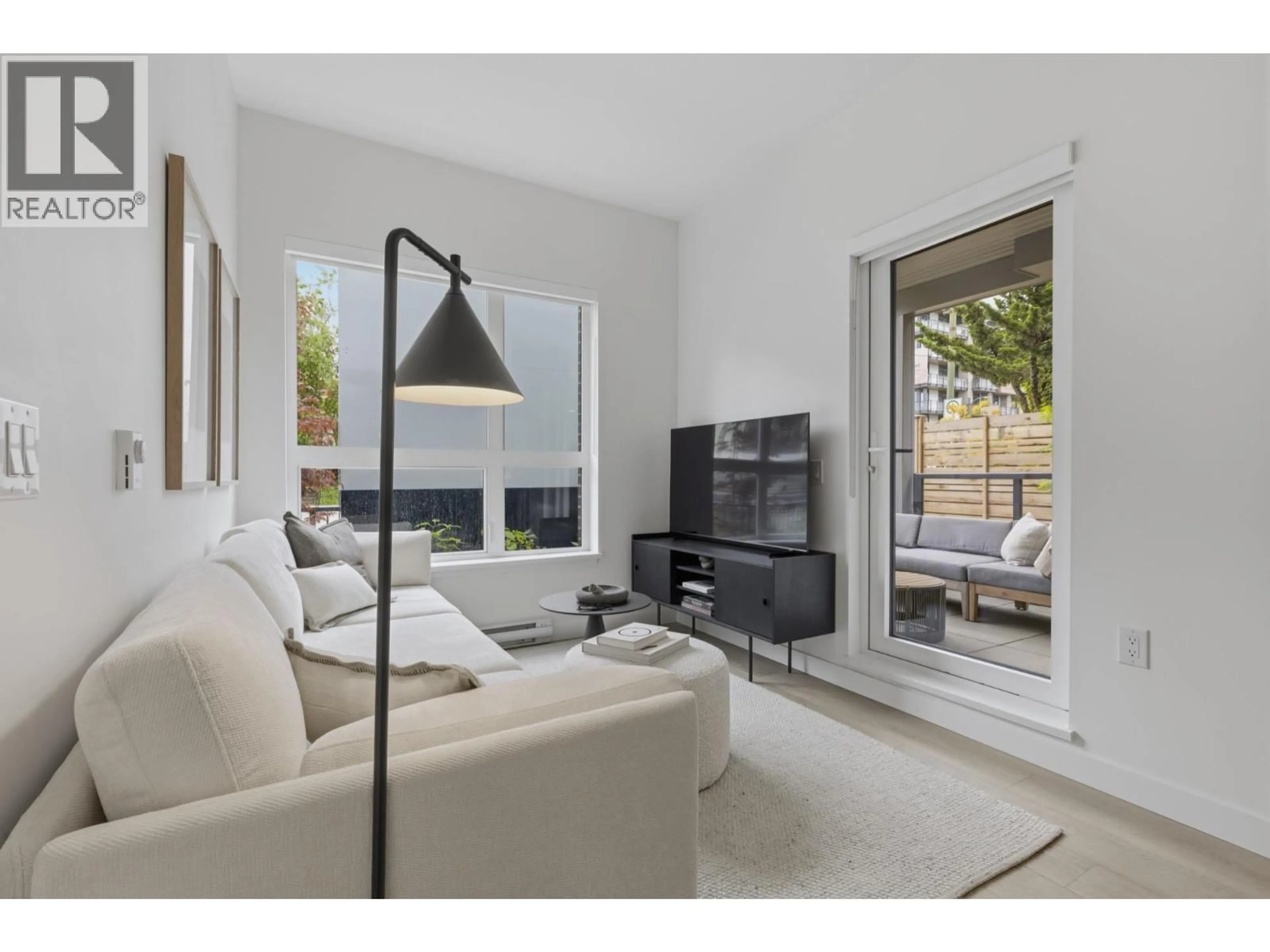Living room with furniture, unknown for 107 - 2268 BROADWAY, Vancouver British Columbia V5N0L2