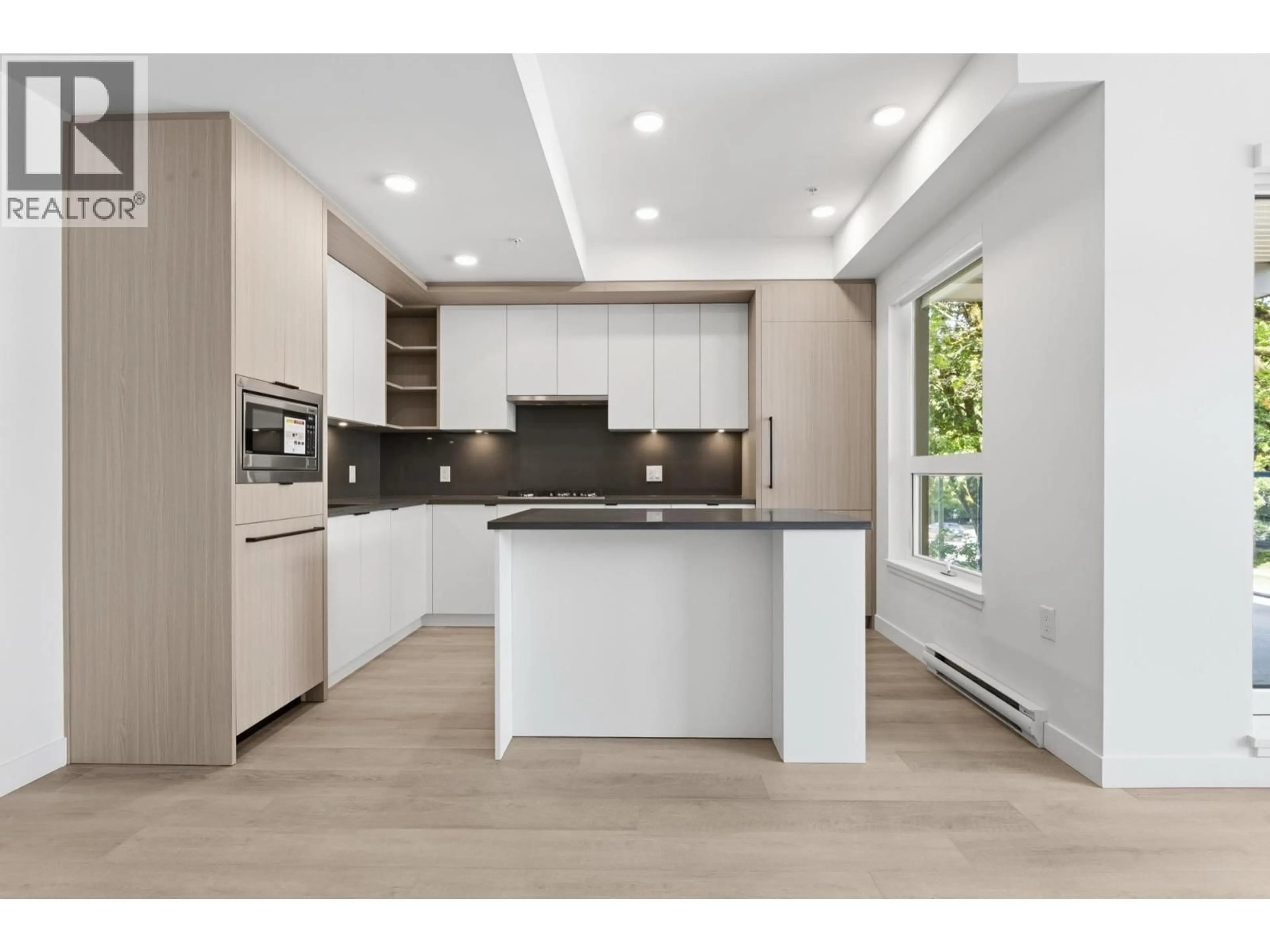 Open concept kitchen, unknown for 203 - 2268 BROADWAY, Vancouver British Columbia V5N0L2