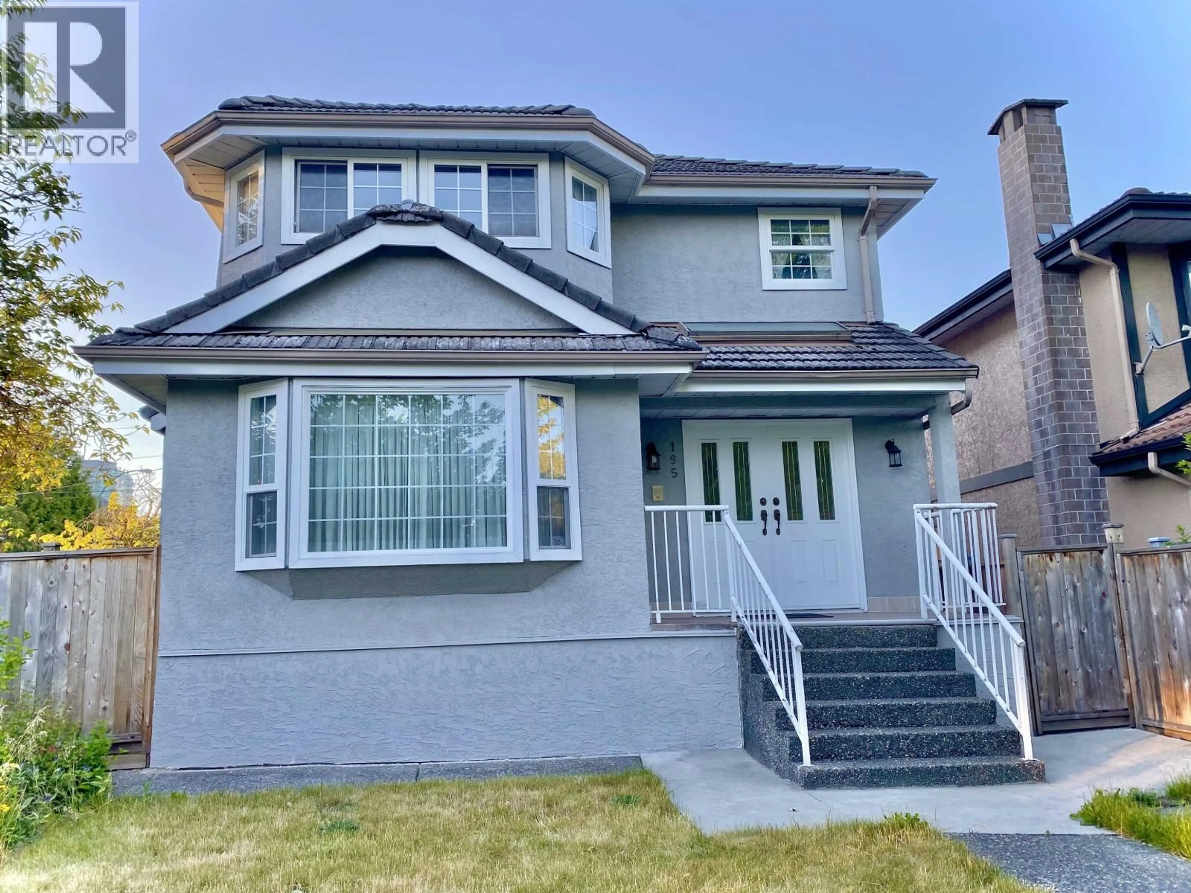 Home with vinyl exterior material, street for 195 46TH AVENUE, Vancouver British Columbia V5Y3V4
