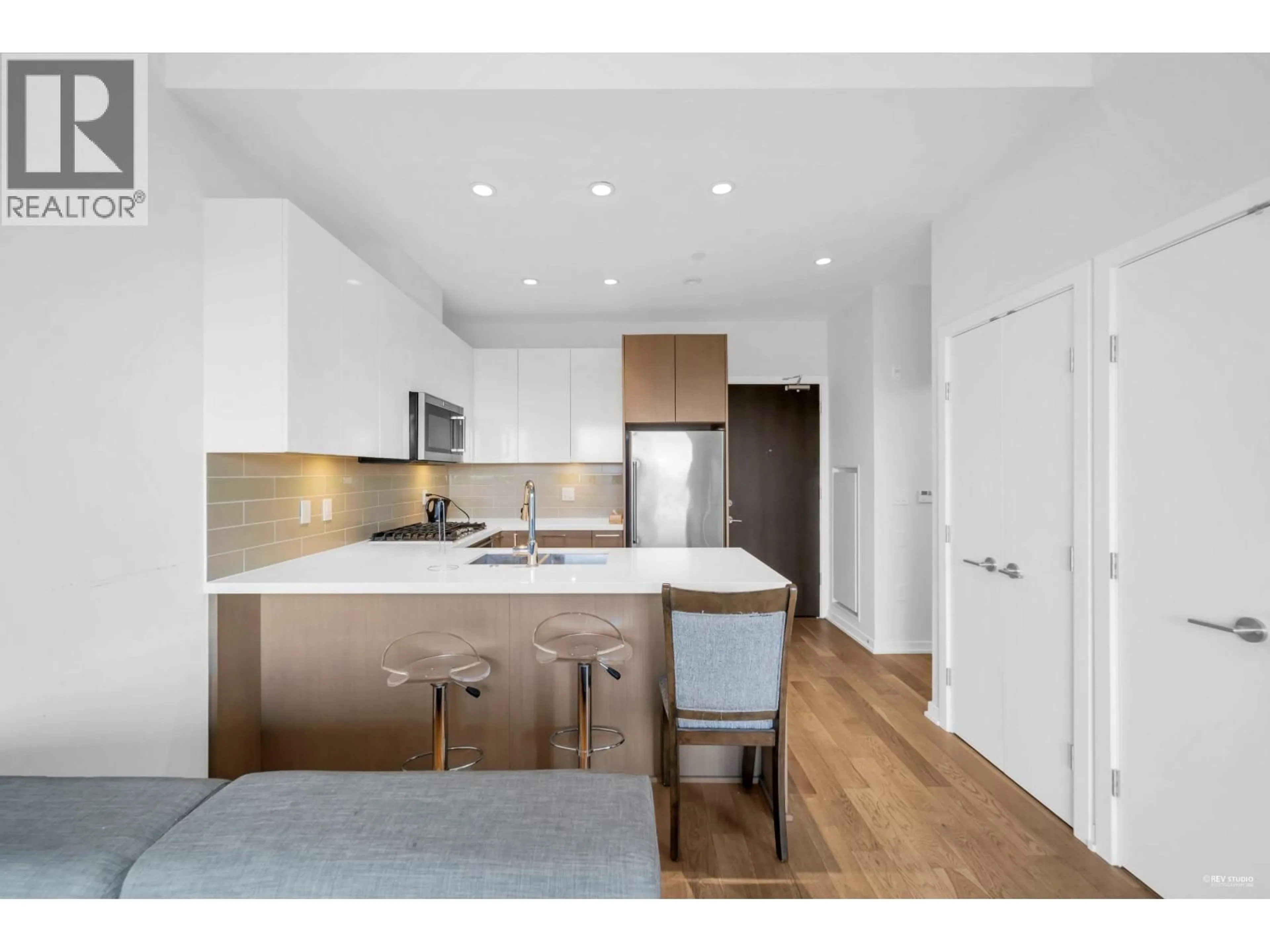 Open concept kitchen, wood/laminate floor for 603 - 7008 RIVER PARKWAY, Richmond British Columbia V6X0R1